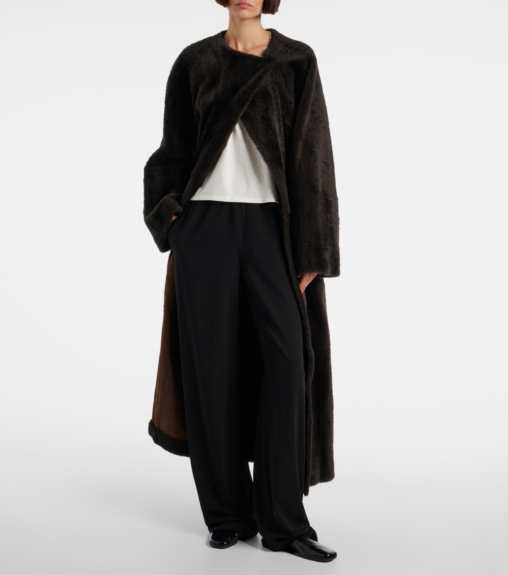 The Row Madelina belted shearling coat