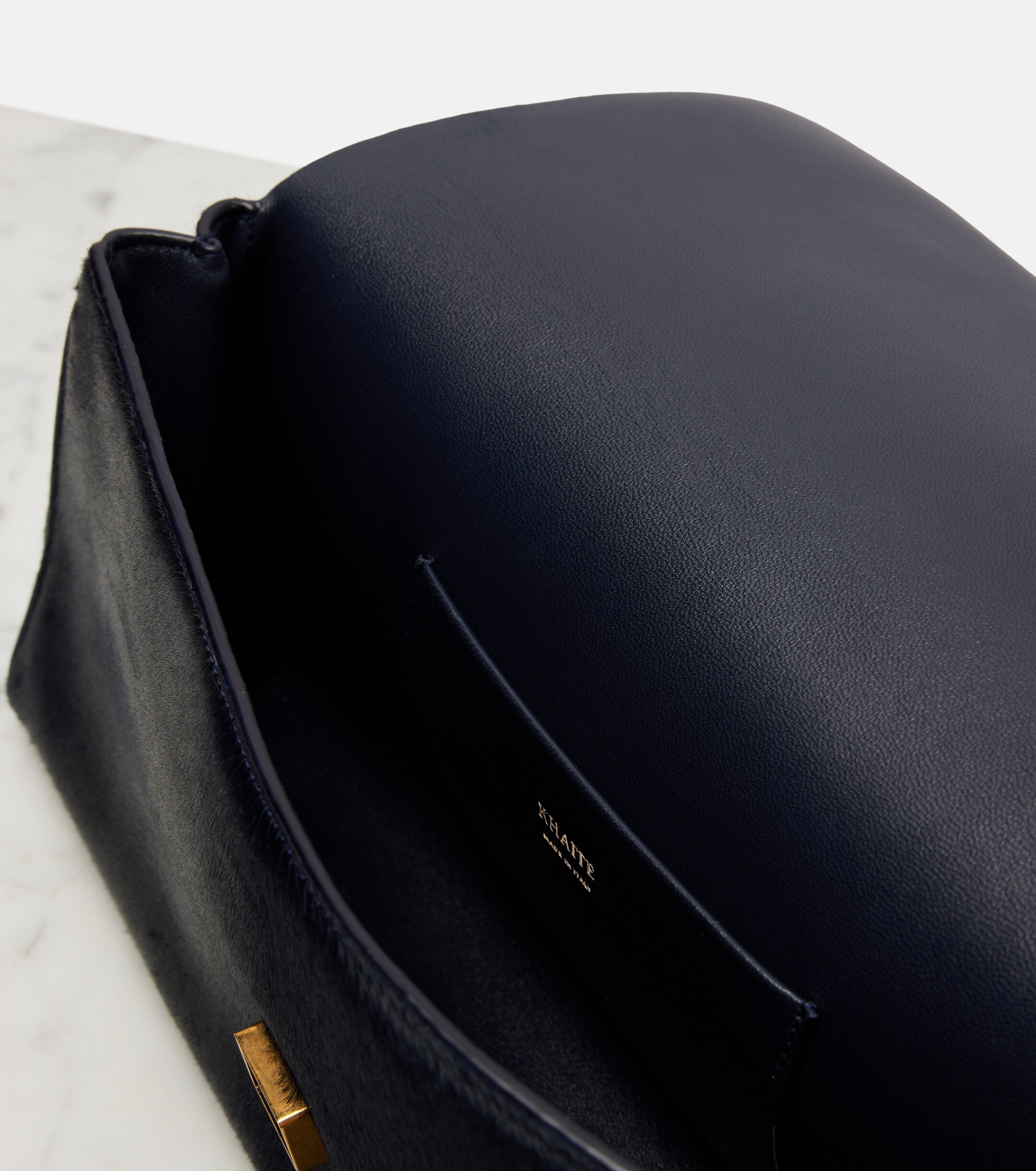 KHAITE Audrey calf hair clutch
