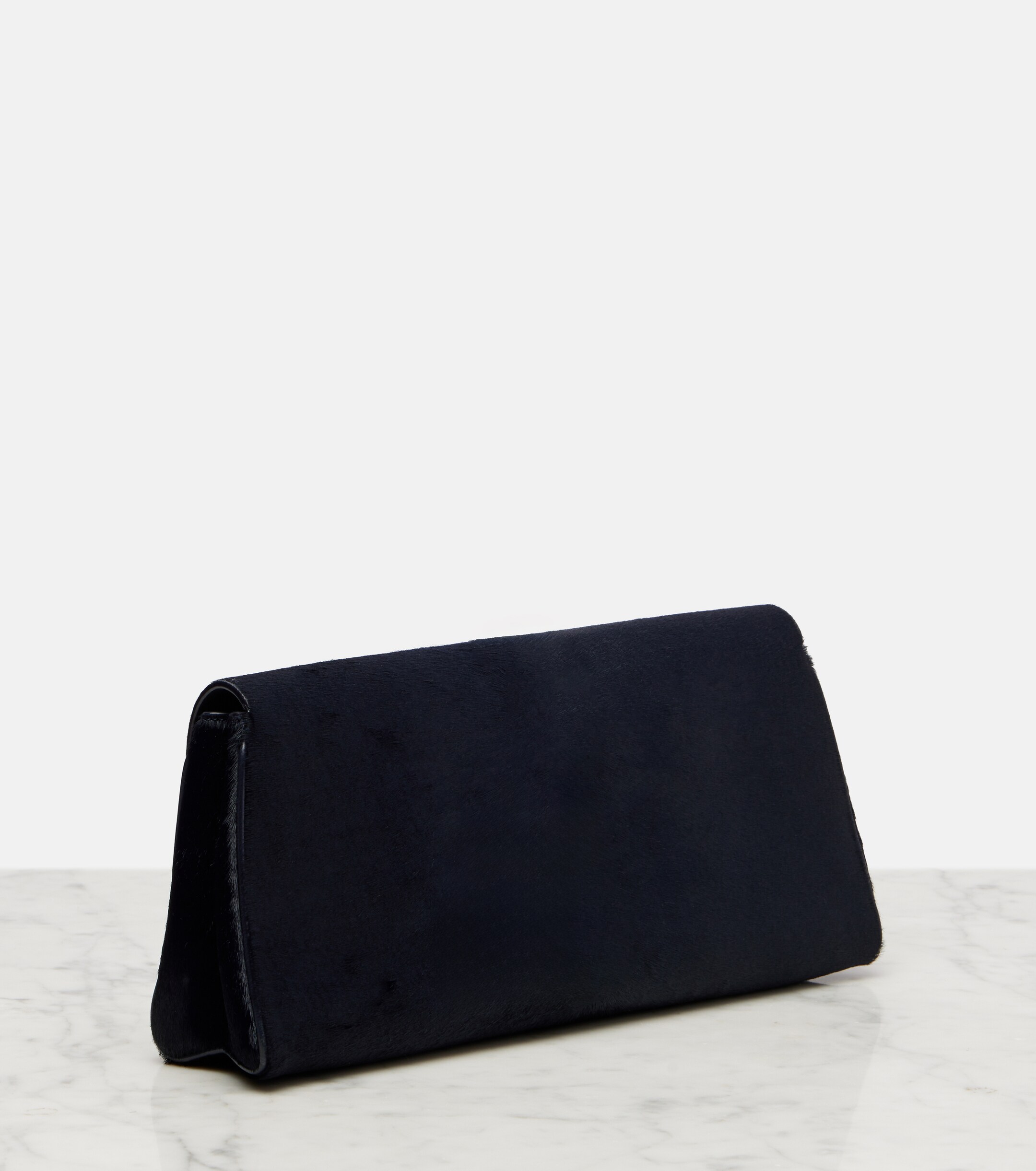 KHAITE Audrey calf hair clutch