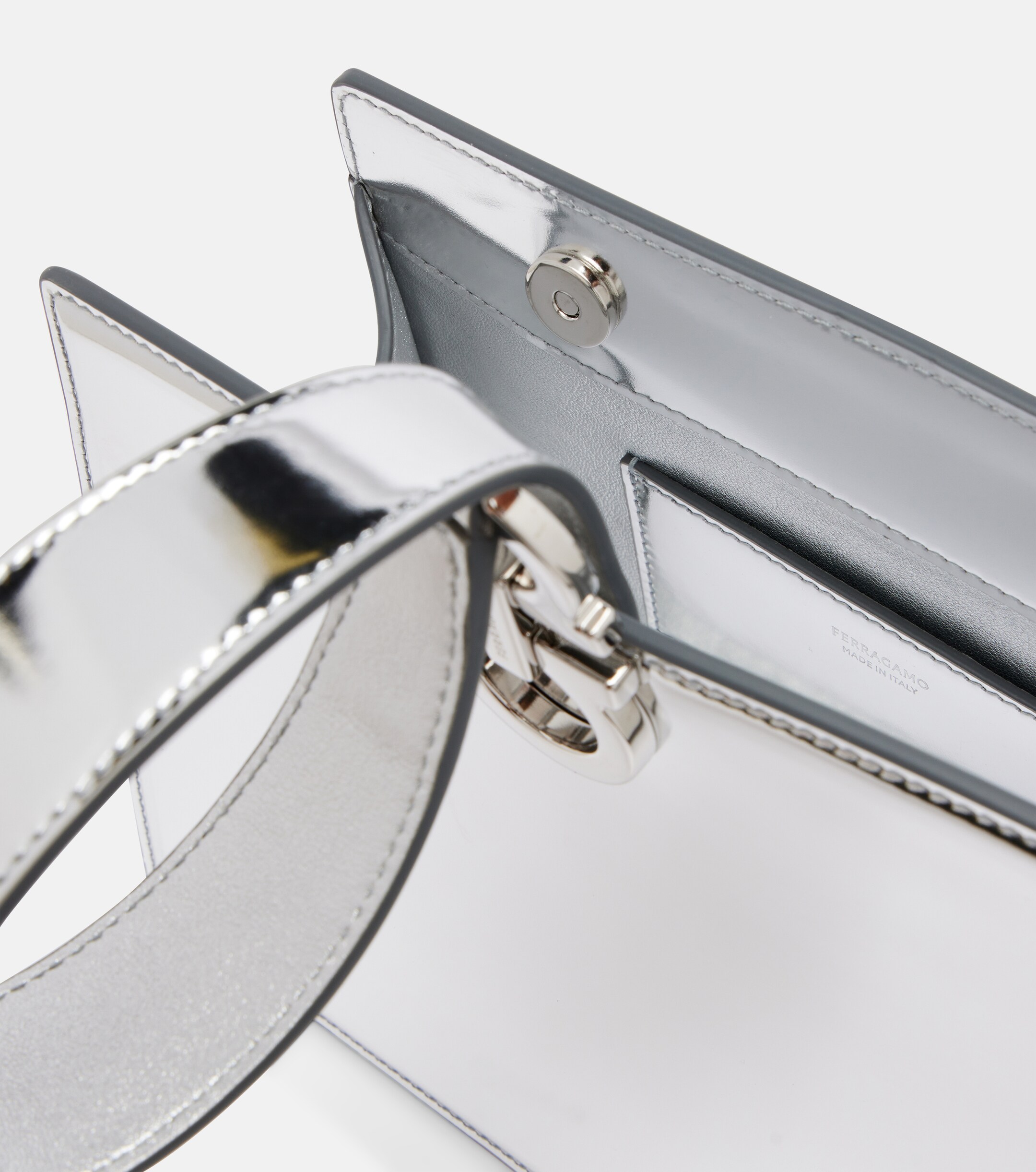 Ferragamo Gancini Small metallic leather clutch