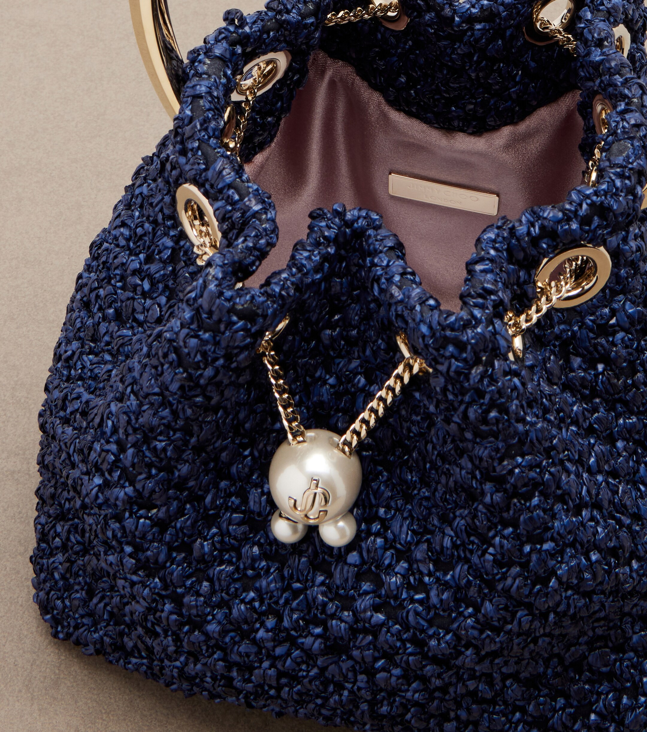 JIMMY CHOO Bon Bon raffia-effect bucket bag