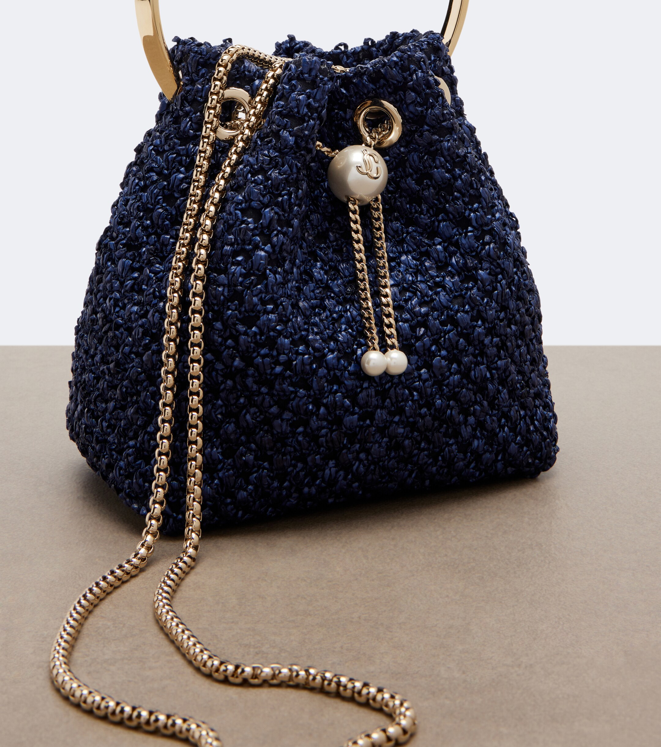 JIMMY CHOO Bon Bon raffia-effect bucket bag