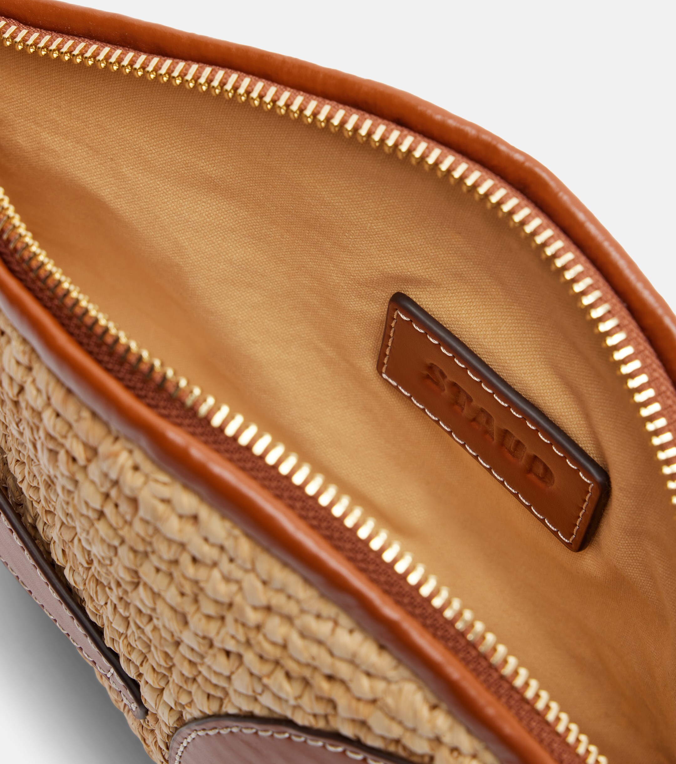 Staud Pesce leather-trimmed raffia clutch