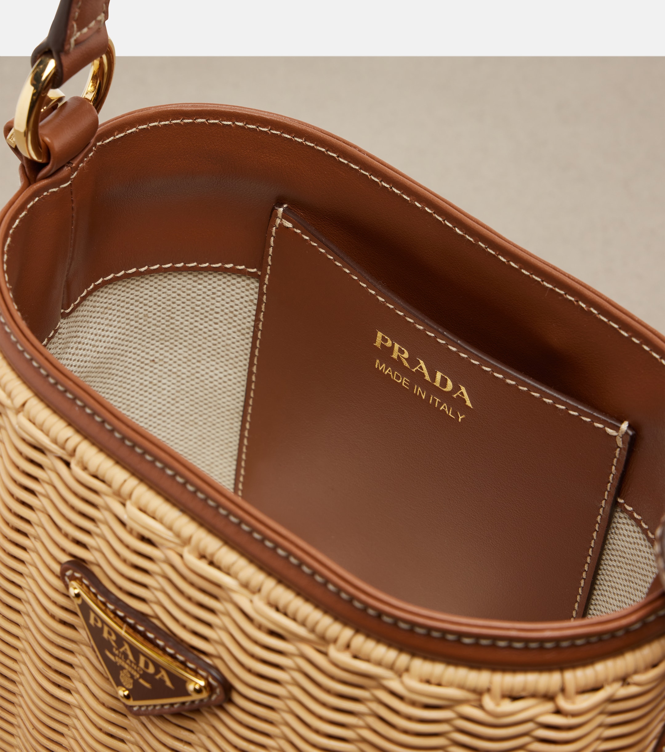 Prada Leather-trimmed wicker bucket bag