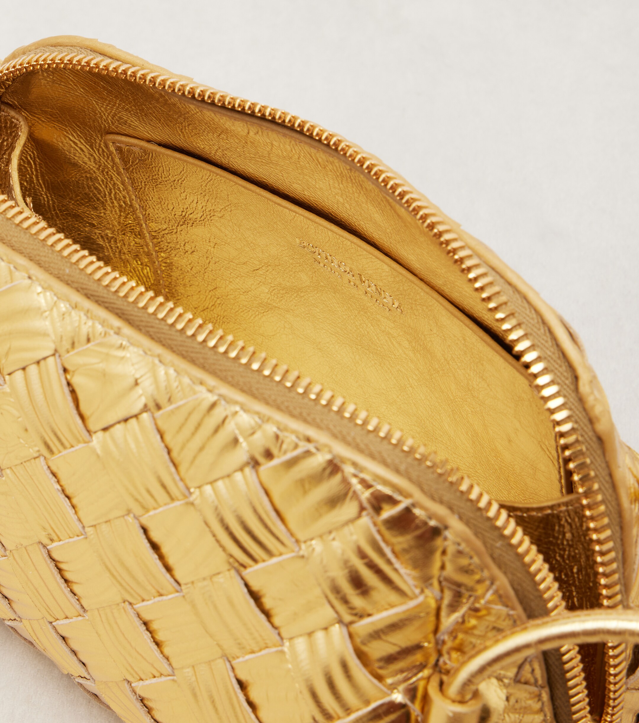 Bottega Veneta Concert Intrecciato metallic leather pouch