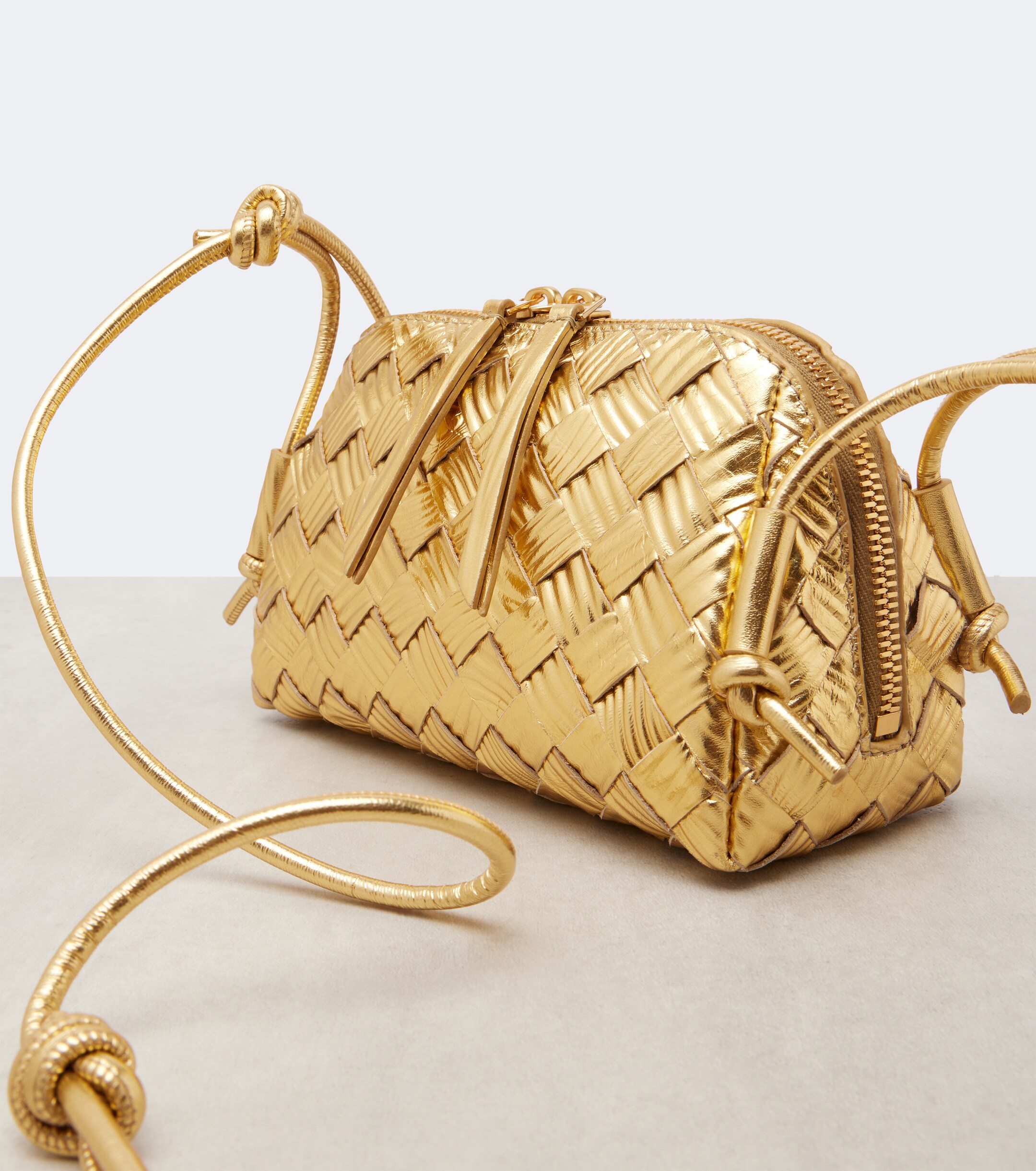 Bottega Veneta Concert Intrecciato metallic leather pouch