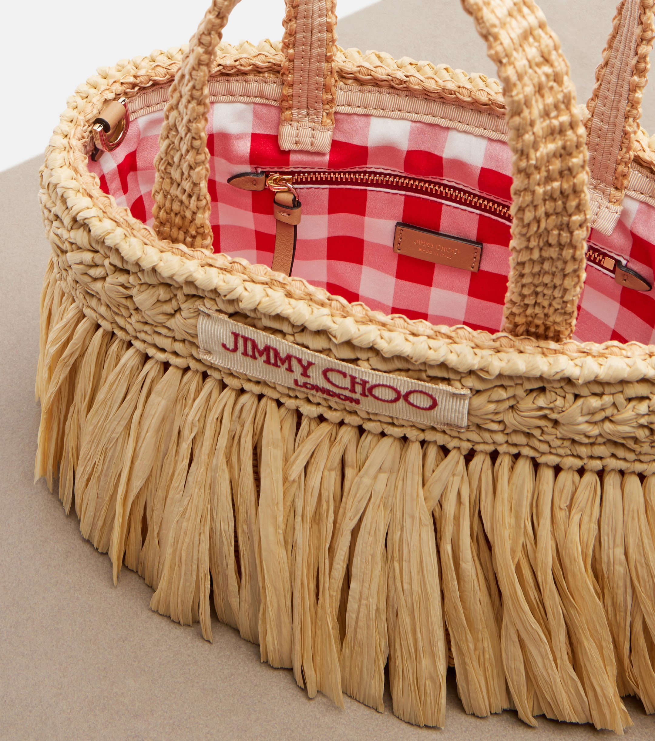JIMMY CHOO Mini fringed raffia top-handle bag