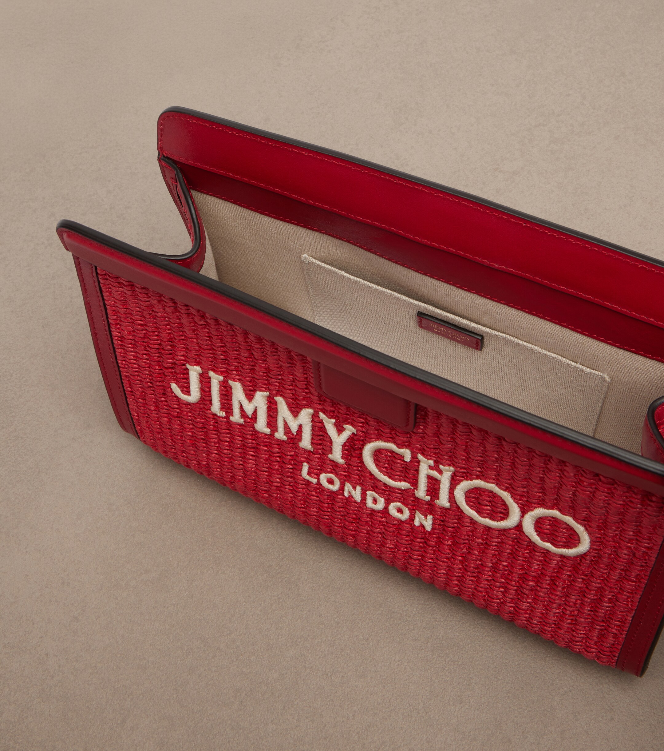 JIMMY CHOO Avenue Small leather-trimmed raffia pouch