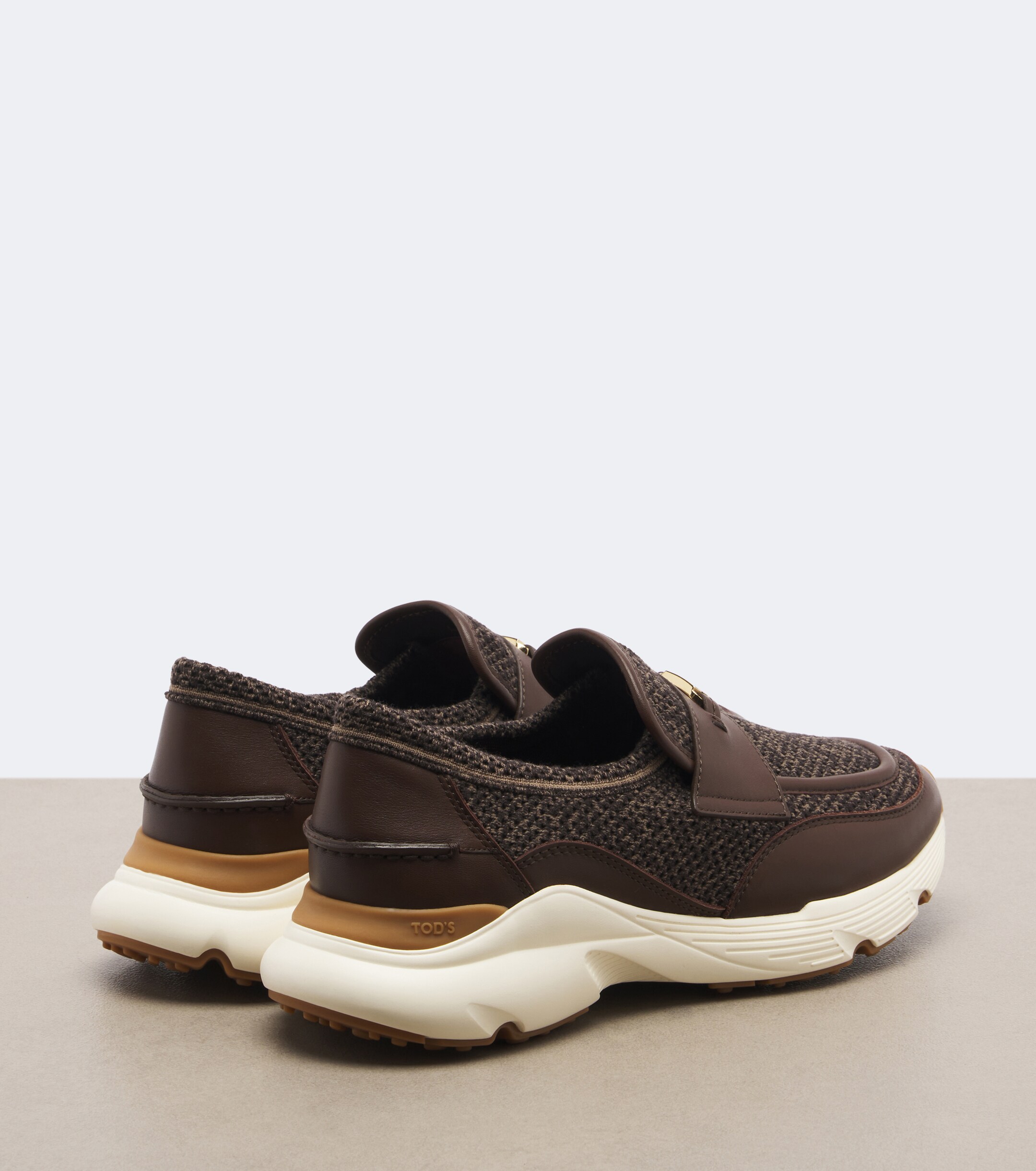 Tod's Tod's Leather-trimmed knitted slip-on shoes