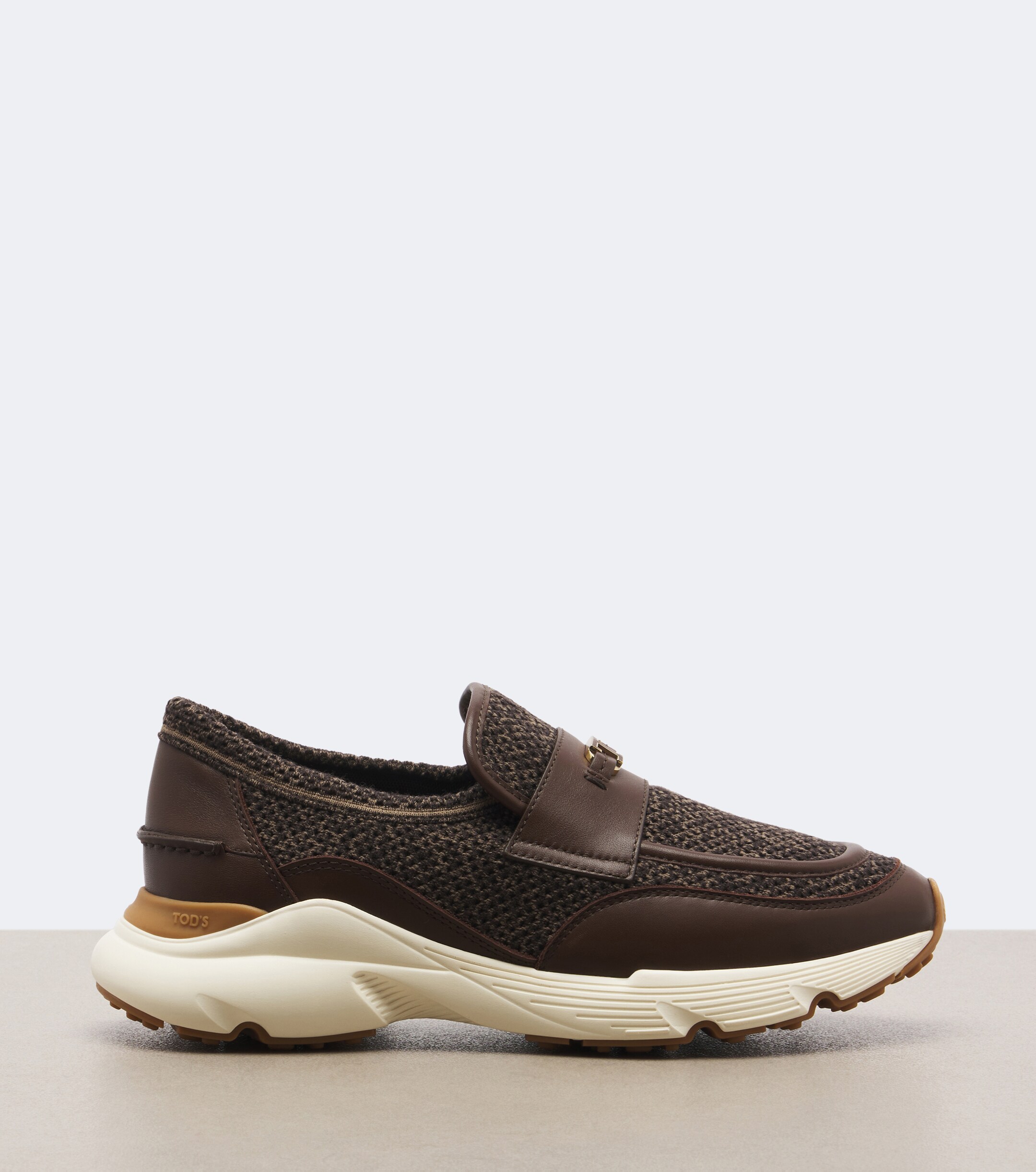 Tod's Tod's Leather-trimmed knitted slip-on shoes