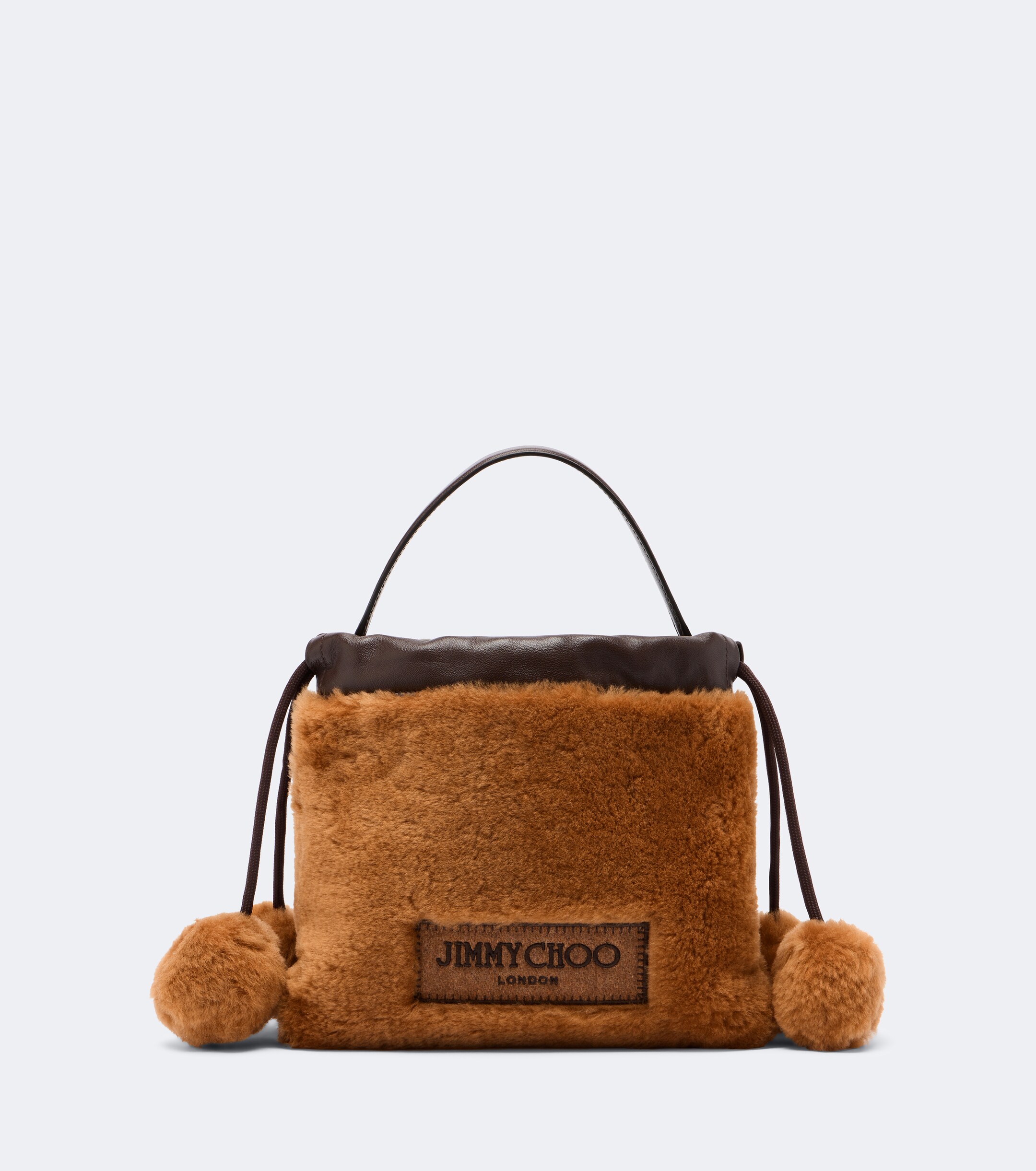 JIMMY CHOO Jimmy Choo Drawstring Mini shearling top-handle bag