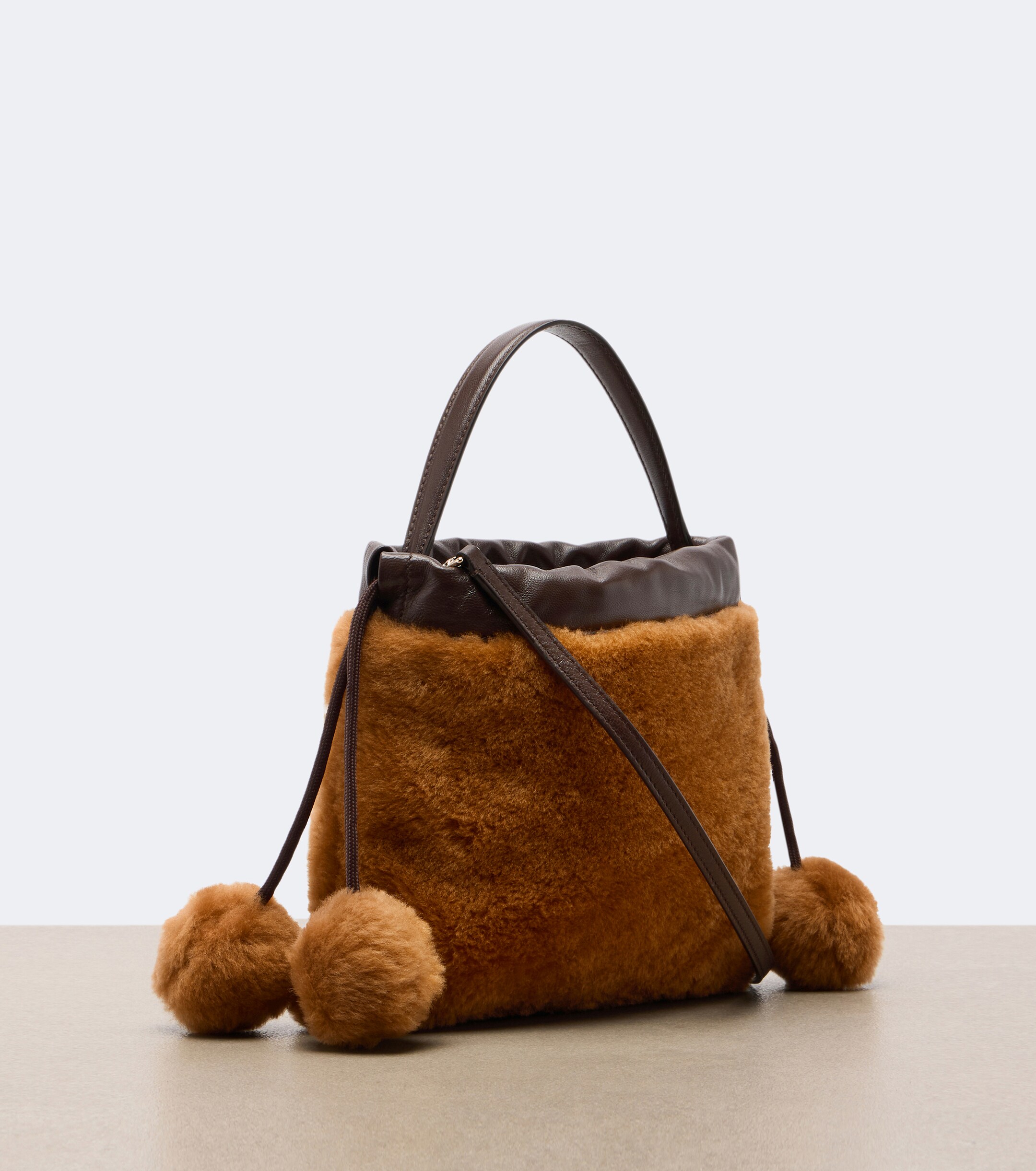 JIMMY CHOO Jimmy Choo Drawstring Mini shearling top-handle bag