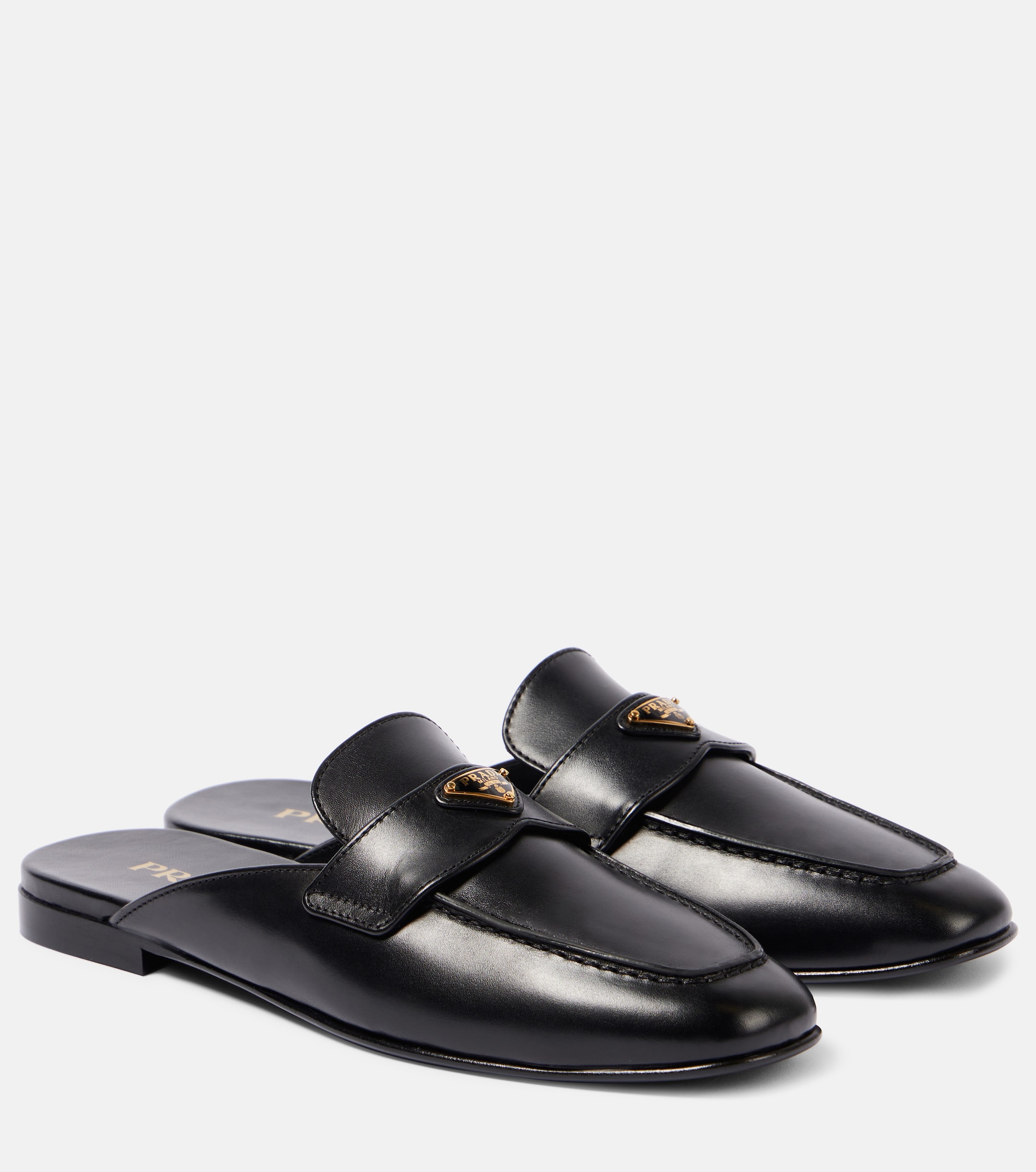 Prada - Leather mules | Plush