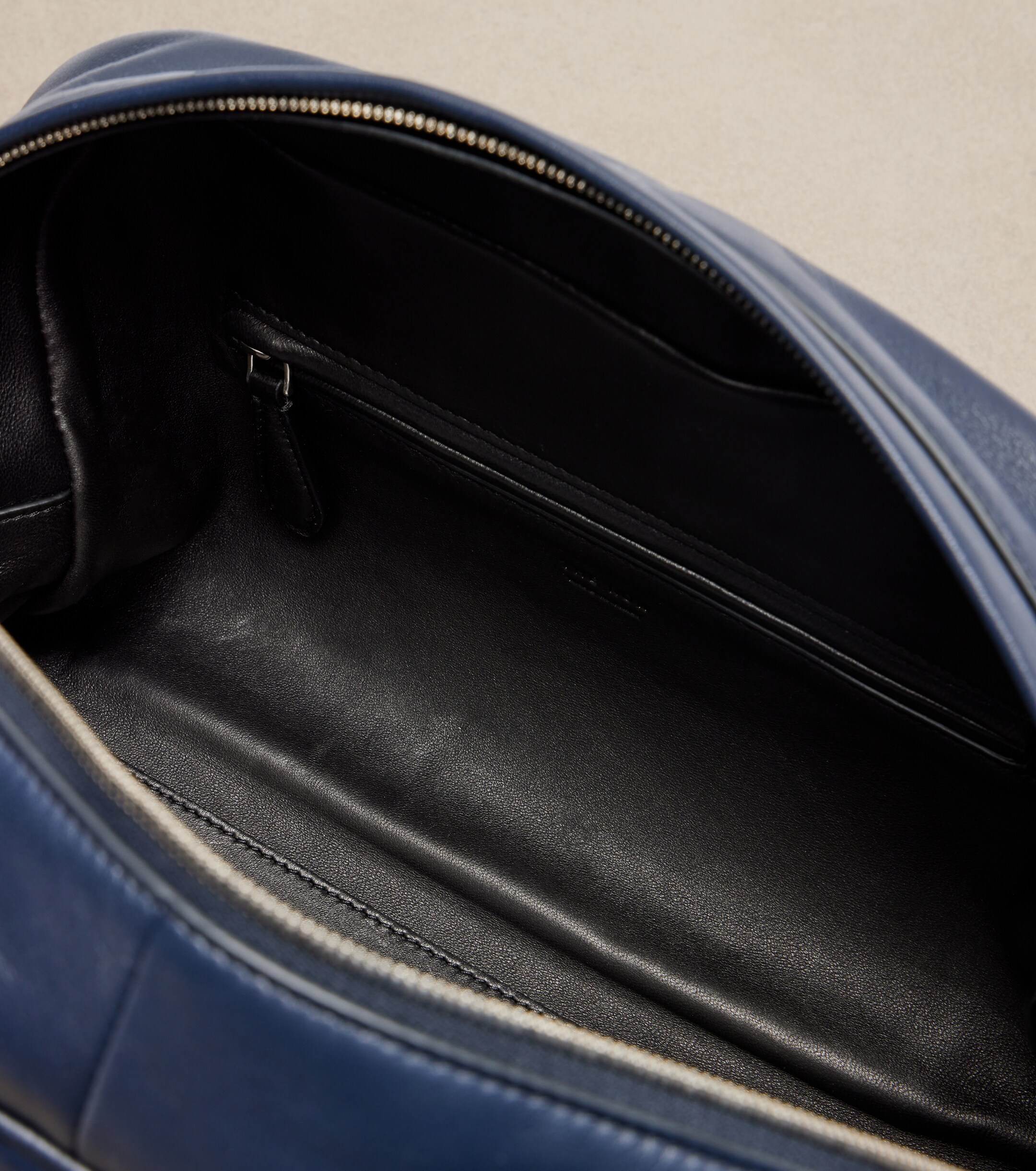 The Row Leila Small leather clutch