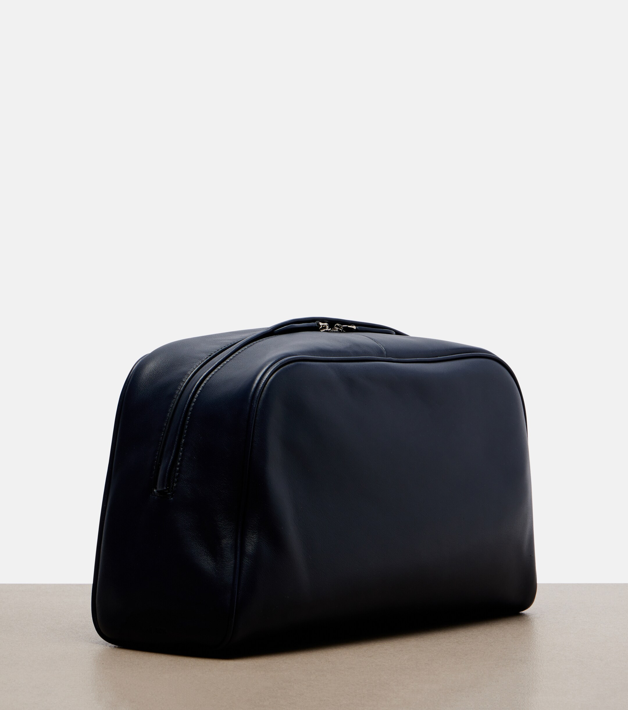 The Row Leila Small leather clutch