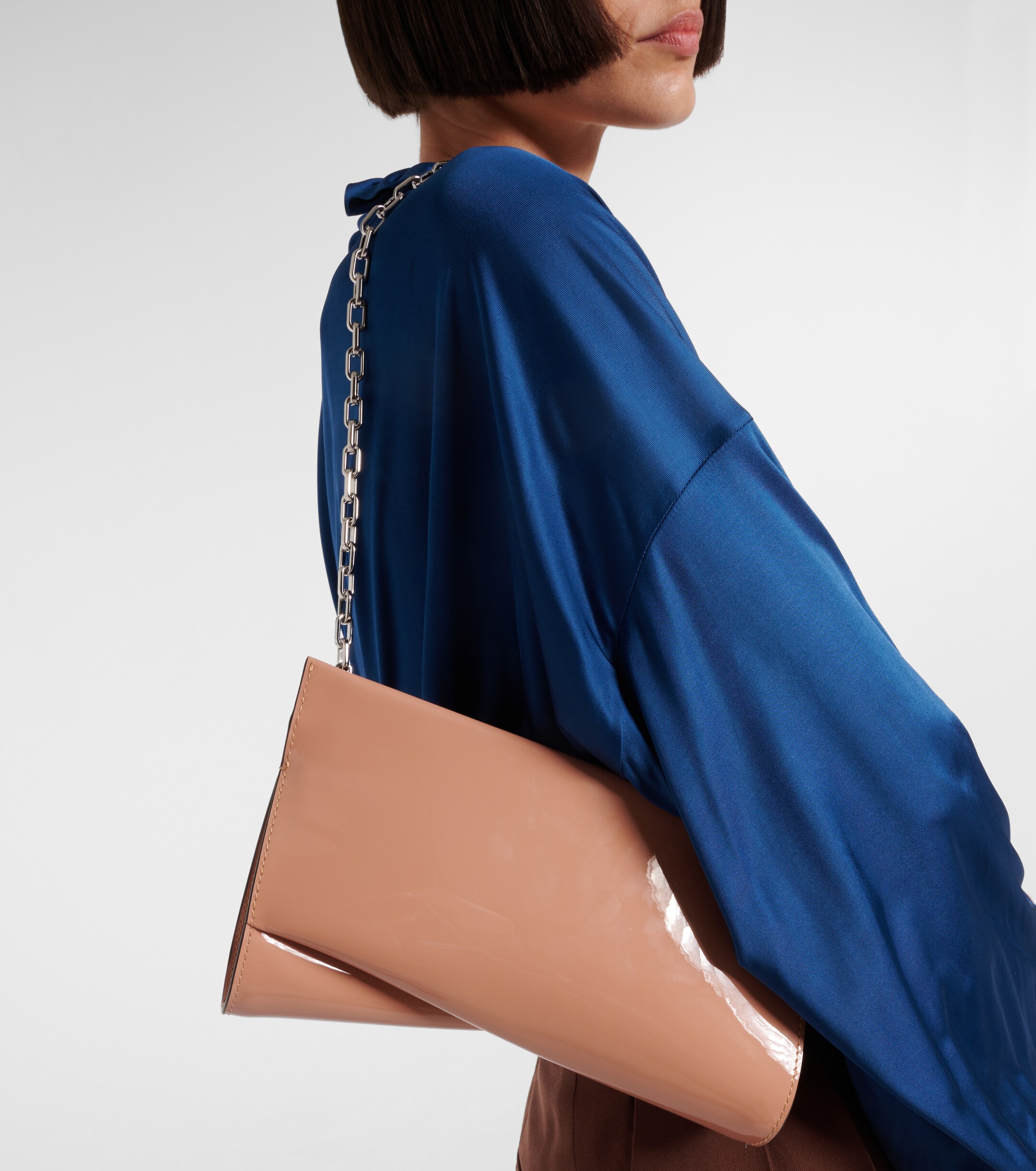 CHRISTIAN LOUBOUTIN Loubitwist Small patent leather clutch