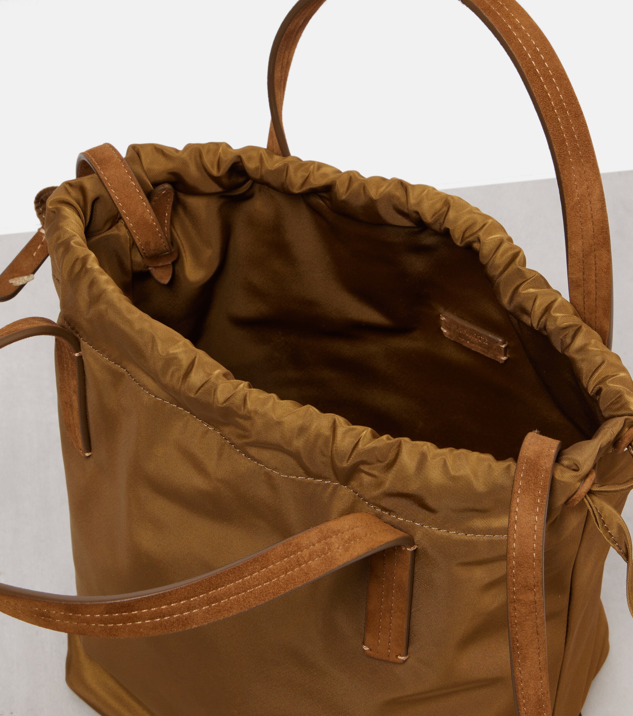 KHAITE Rory Medium leather-trimmed bucket bag