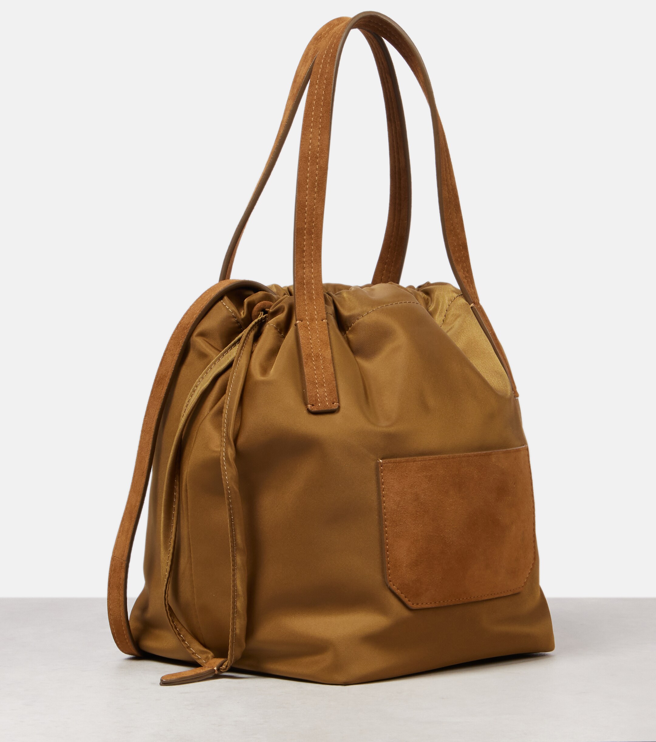 KHAITE Rory Medium leather-trimmed bucket bag
