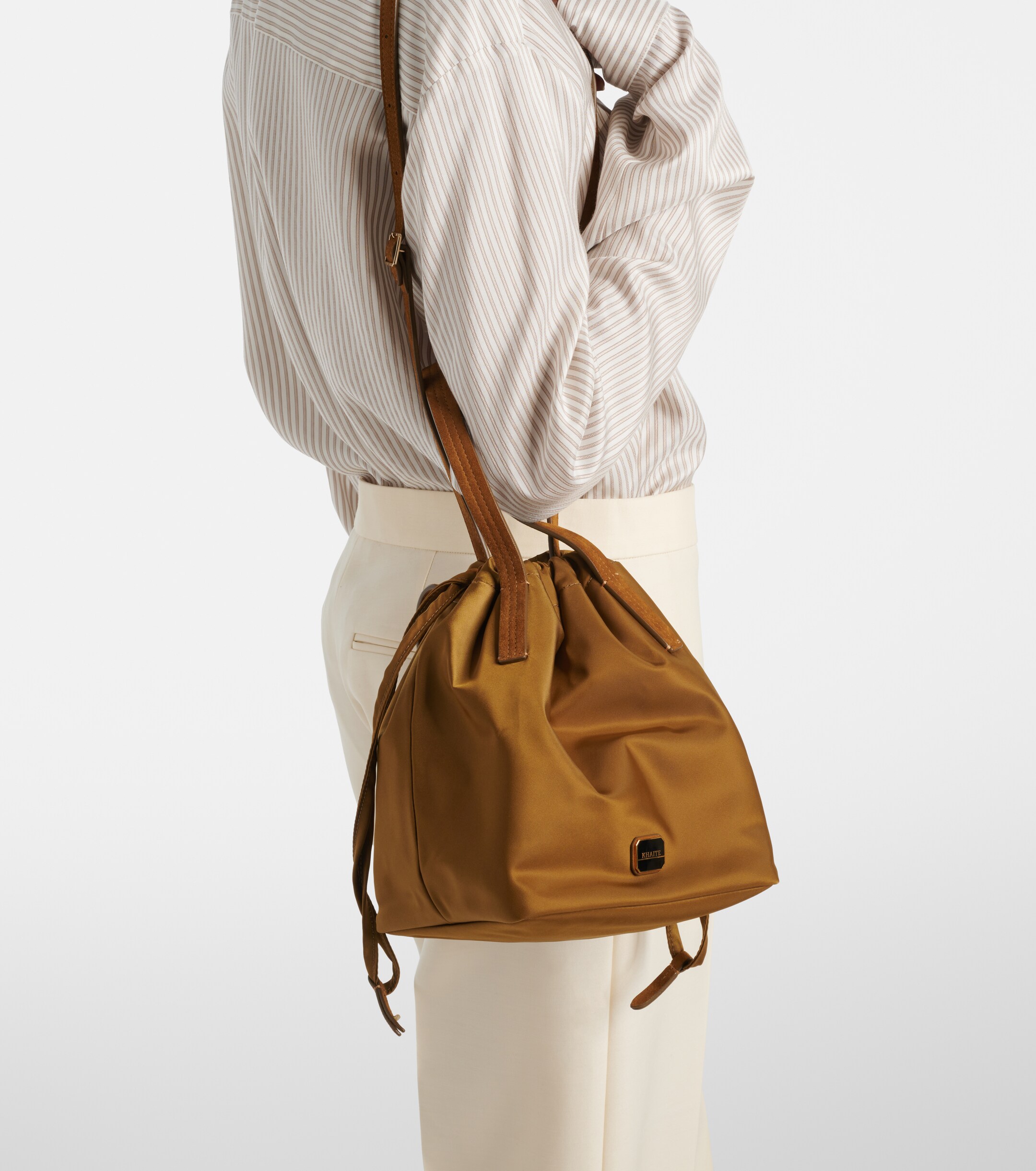 KHAITE Rory Medium leather-trimmed bucket bag