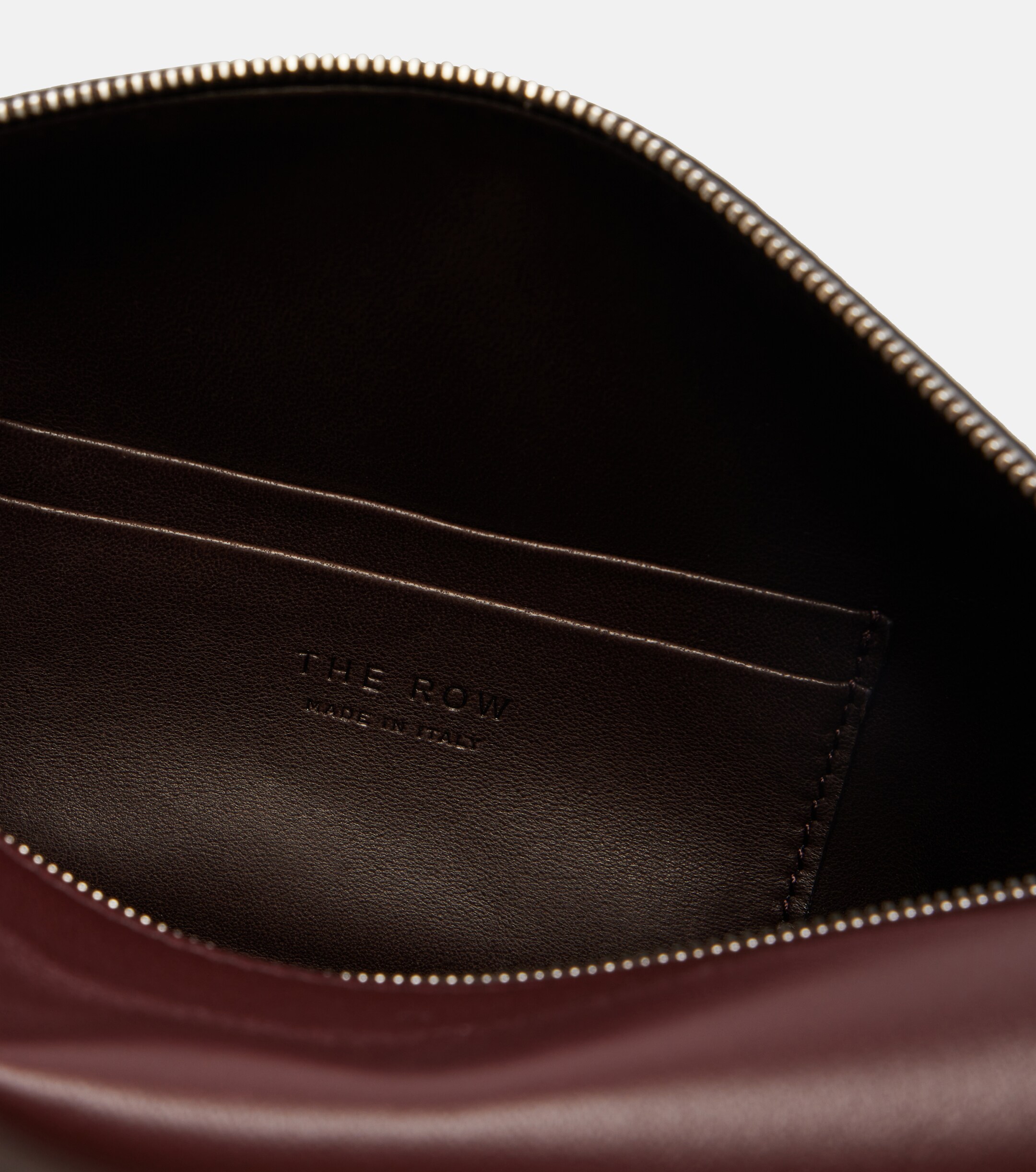 The Row Squared Compact leather clutch
