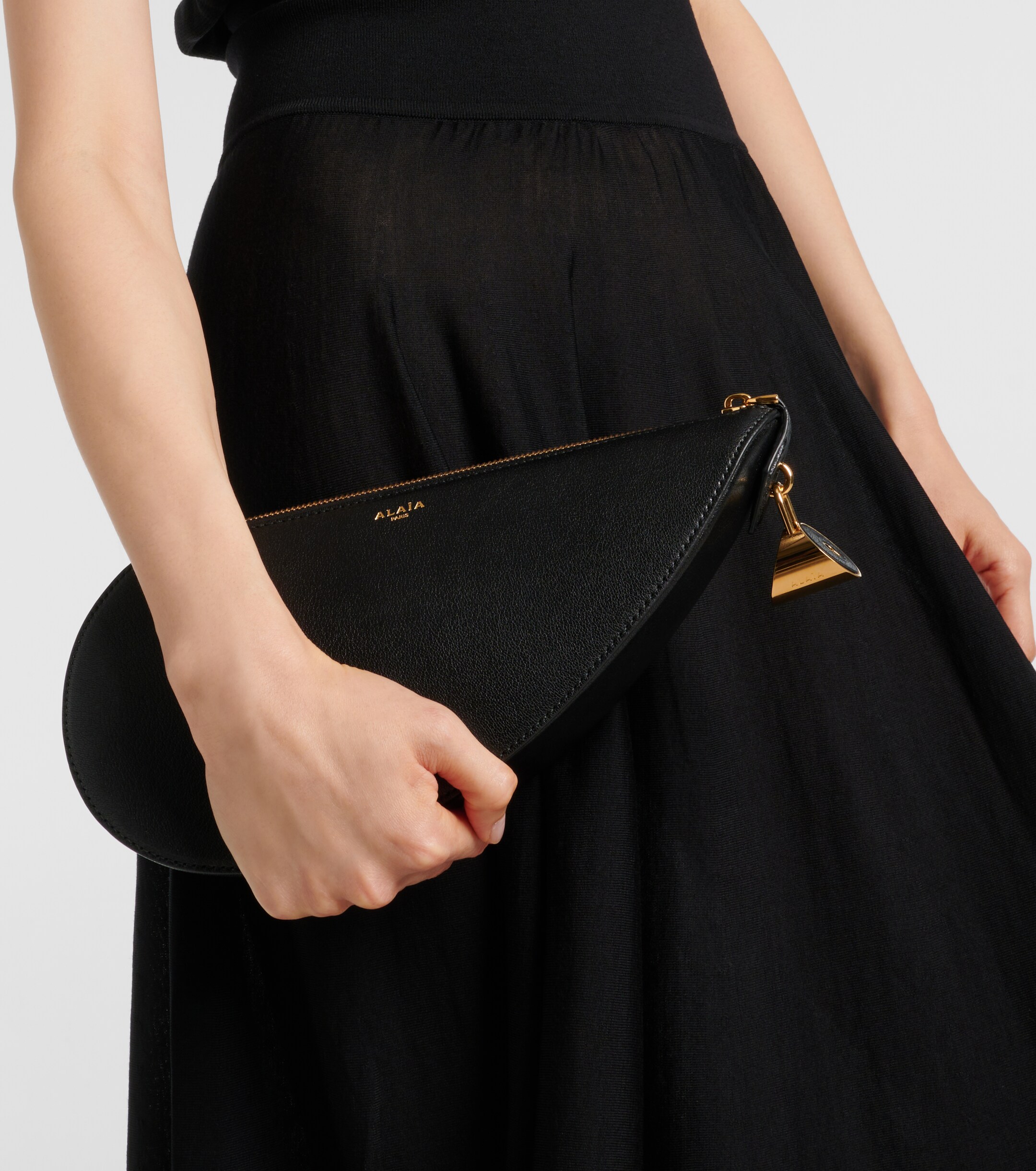 Alaïa Le Demi Cœur leather clutch
