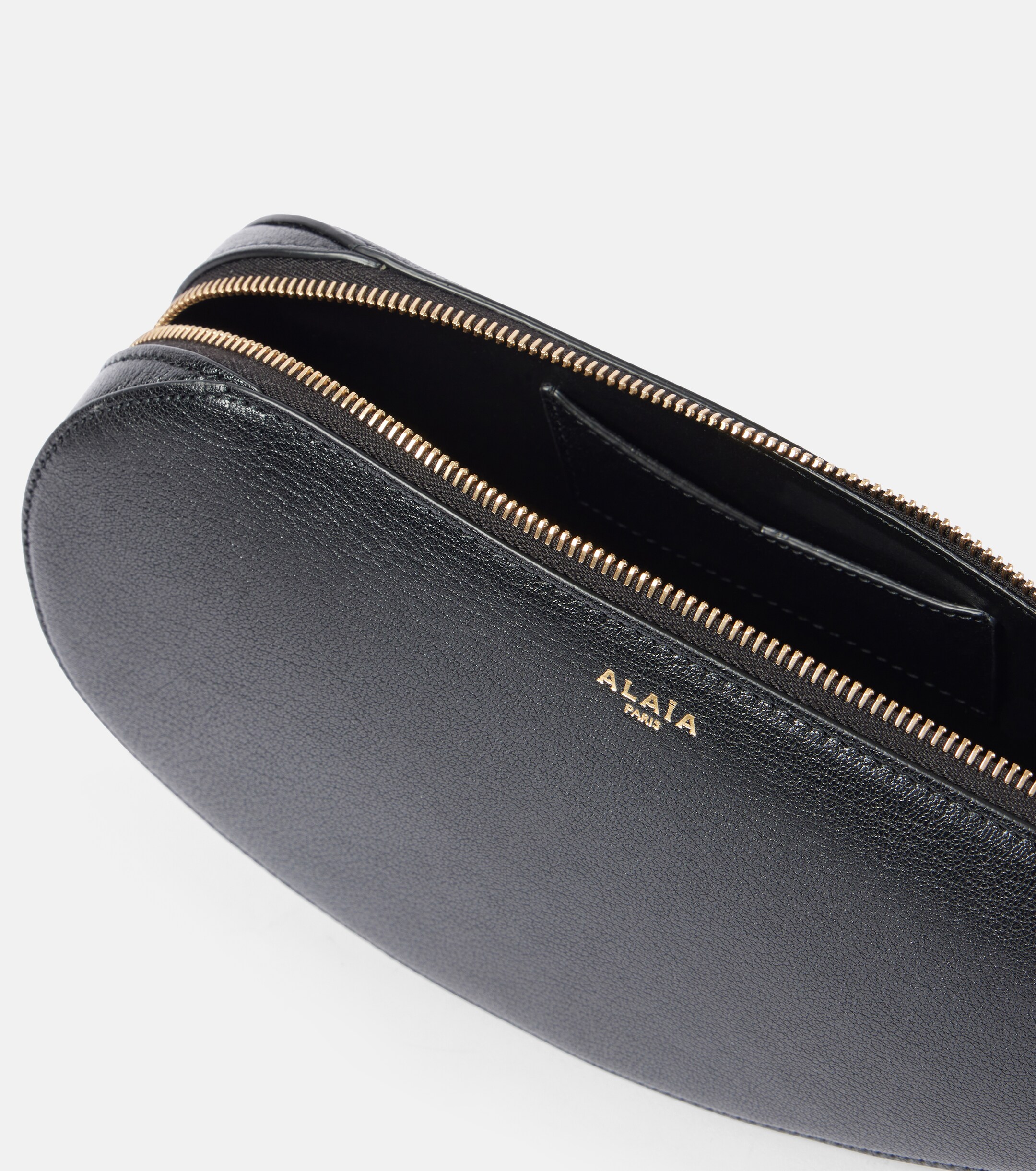 Alaïa Le Demi Cœur leather clutch