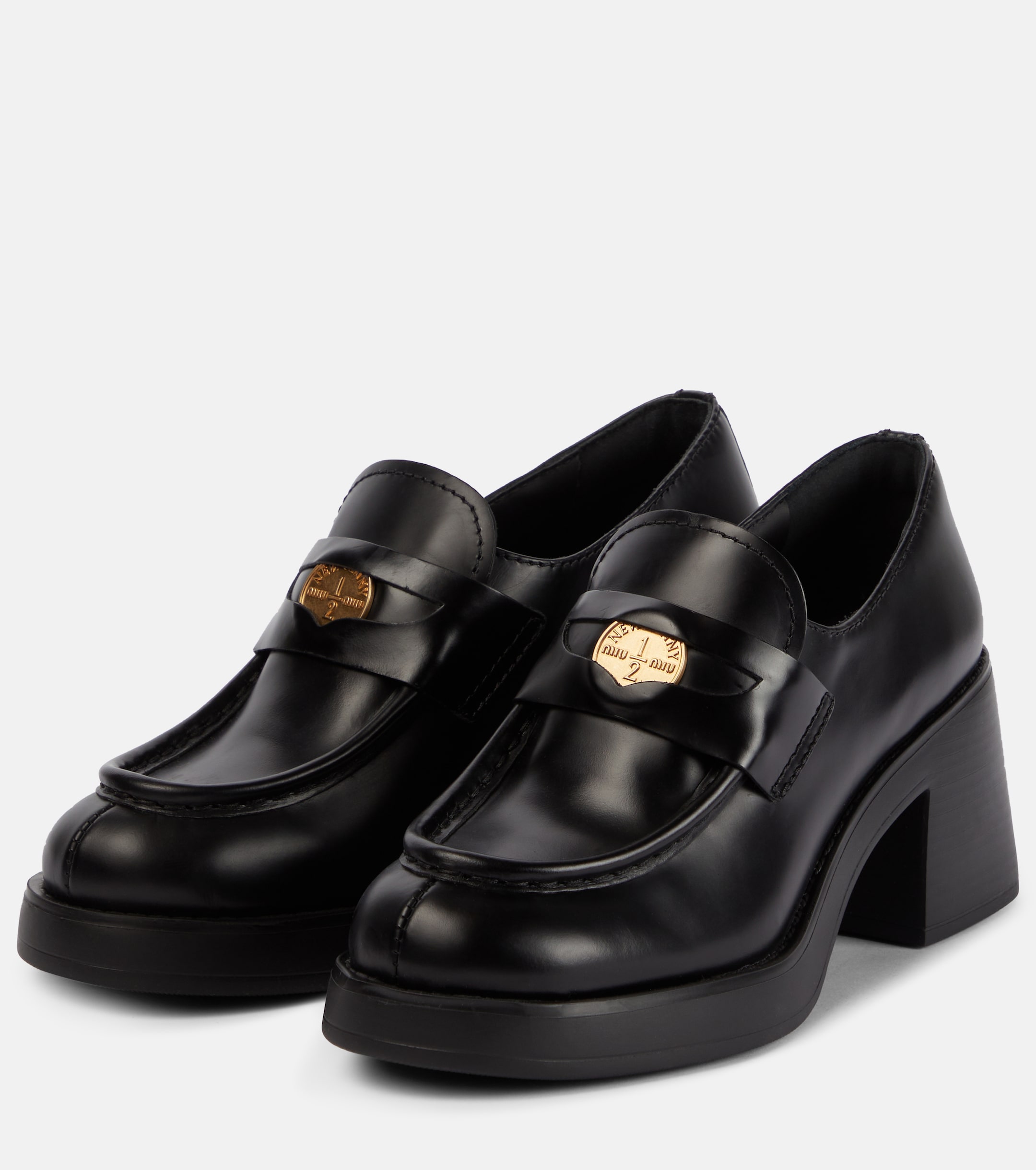 Miu Miu - Leather penny loafers | Plush