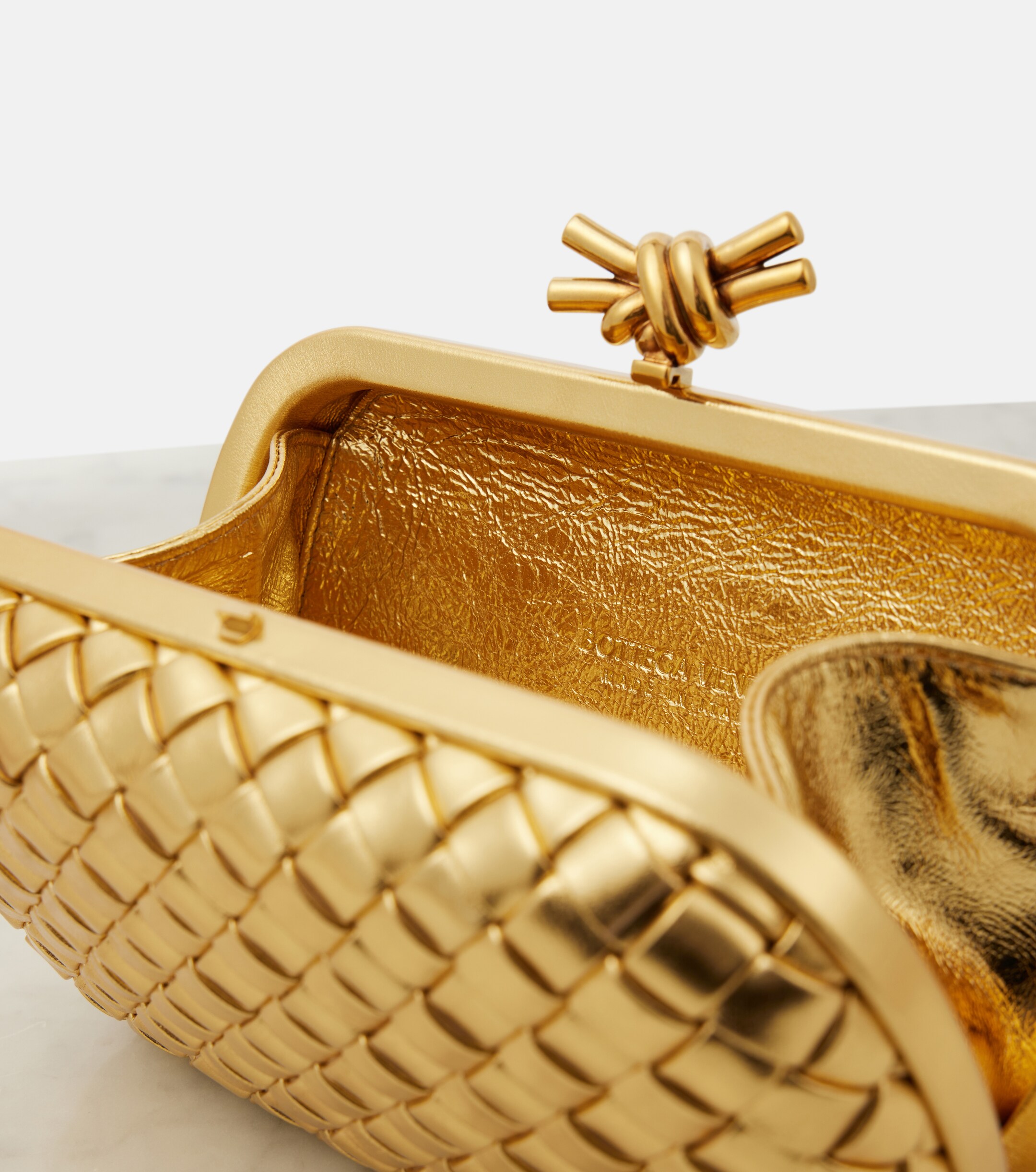 Bottega Veneta Bottega Veneta Knot Intreccio metallic leather clutch