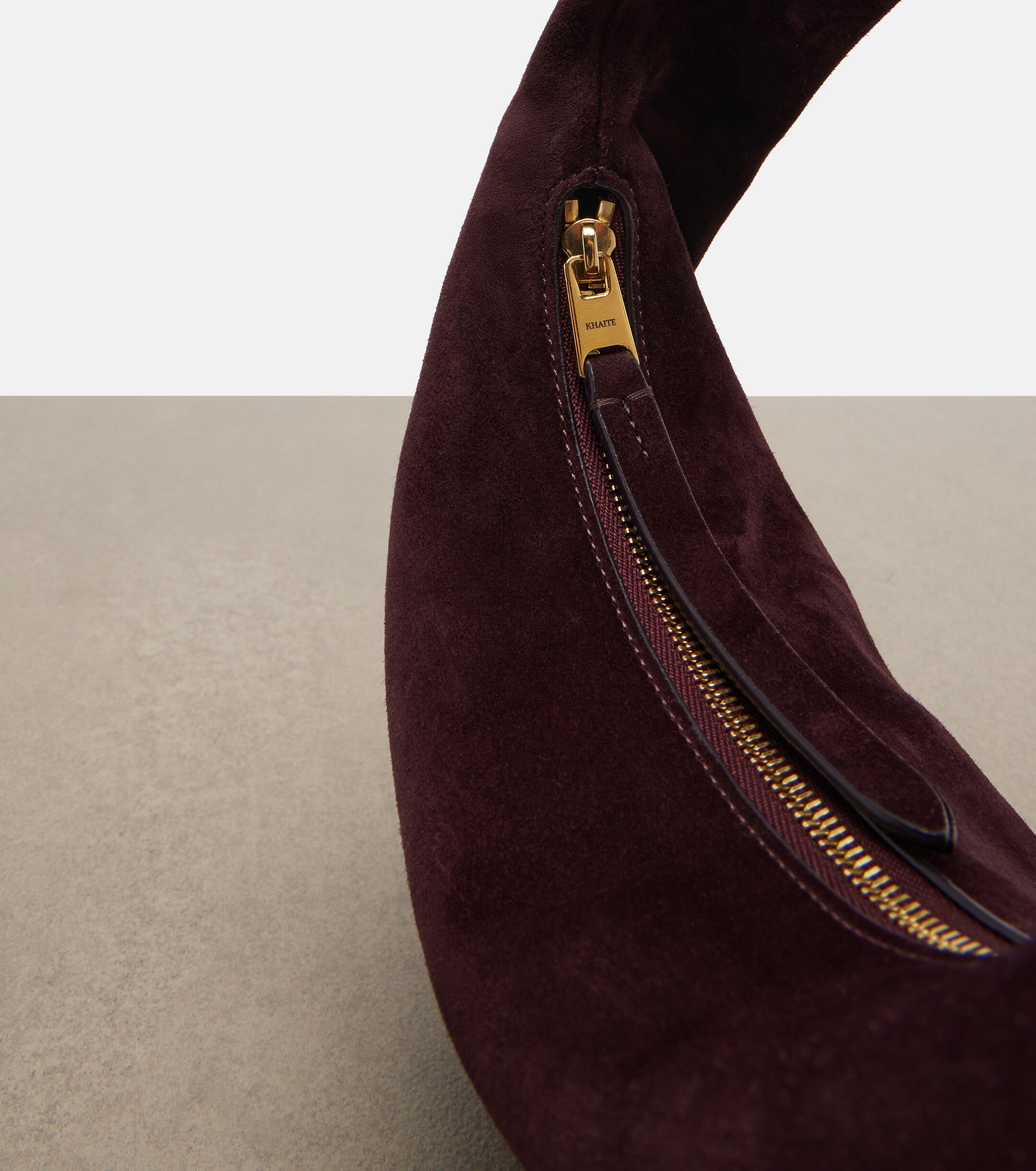 KHAITE Olivia Mini suede top-handle bag