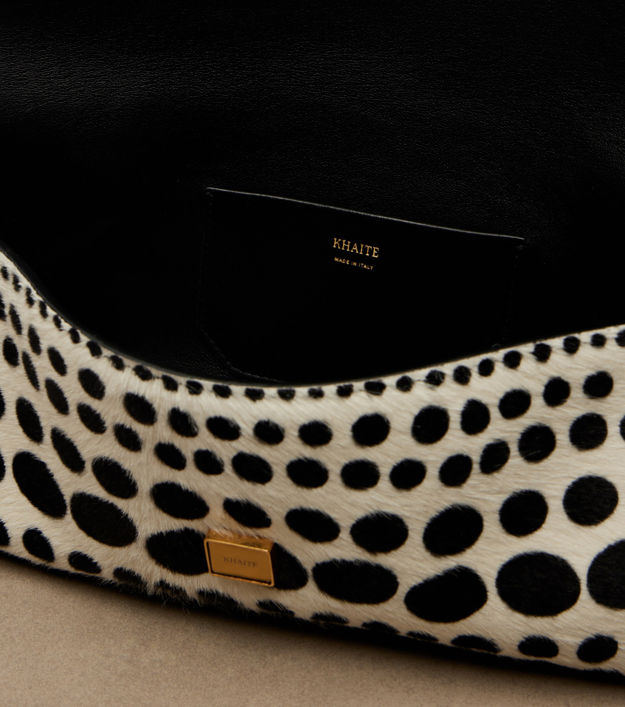 KHAITE Audrey polka-dot calf hair clutch