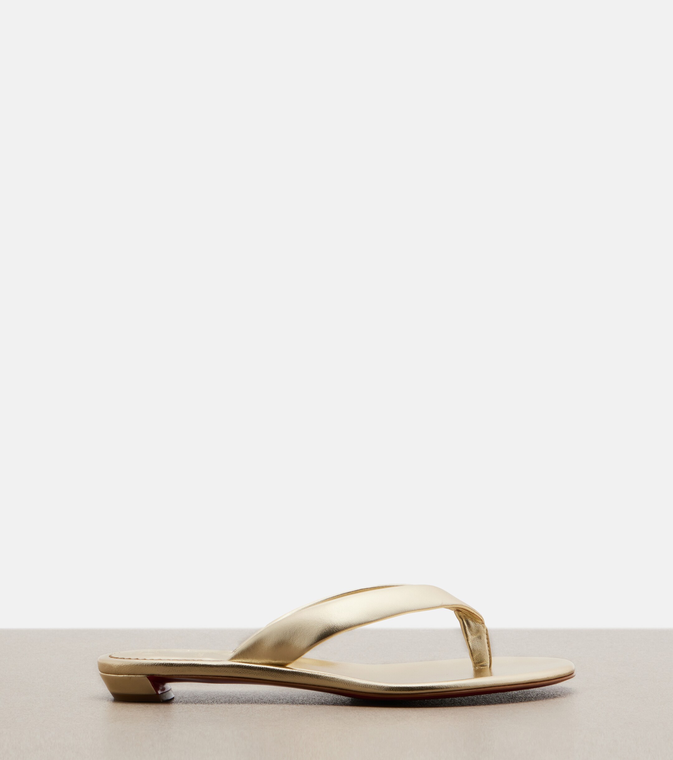 CHRISTIAN LOUBOUTIN Christian Louboutin Miss Z metallic leather thong sandals