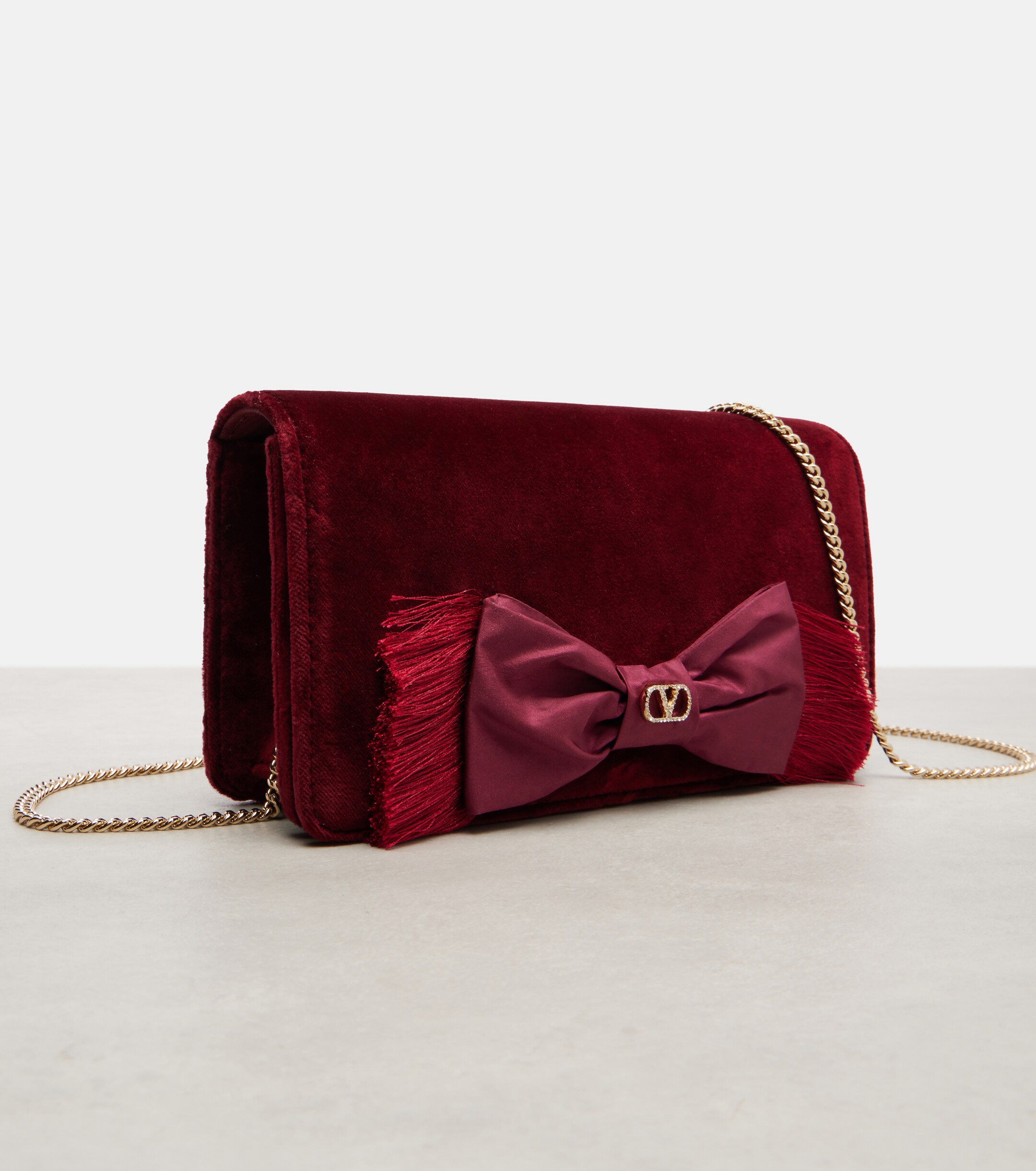 Valentino Garavani VLogo Mini bow-detail velvet clutch thumbnail