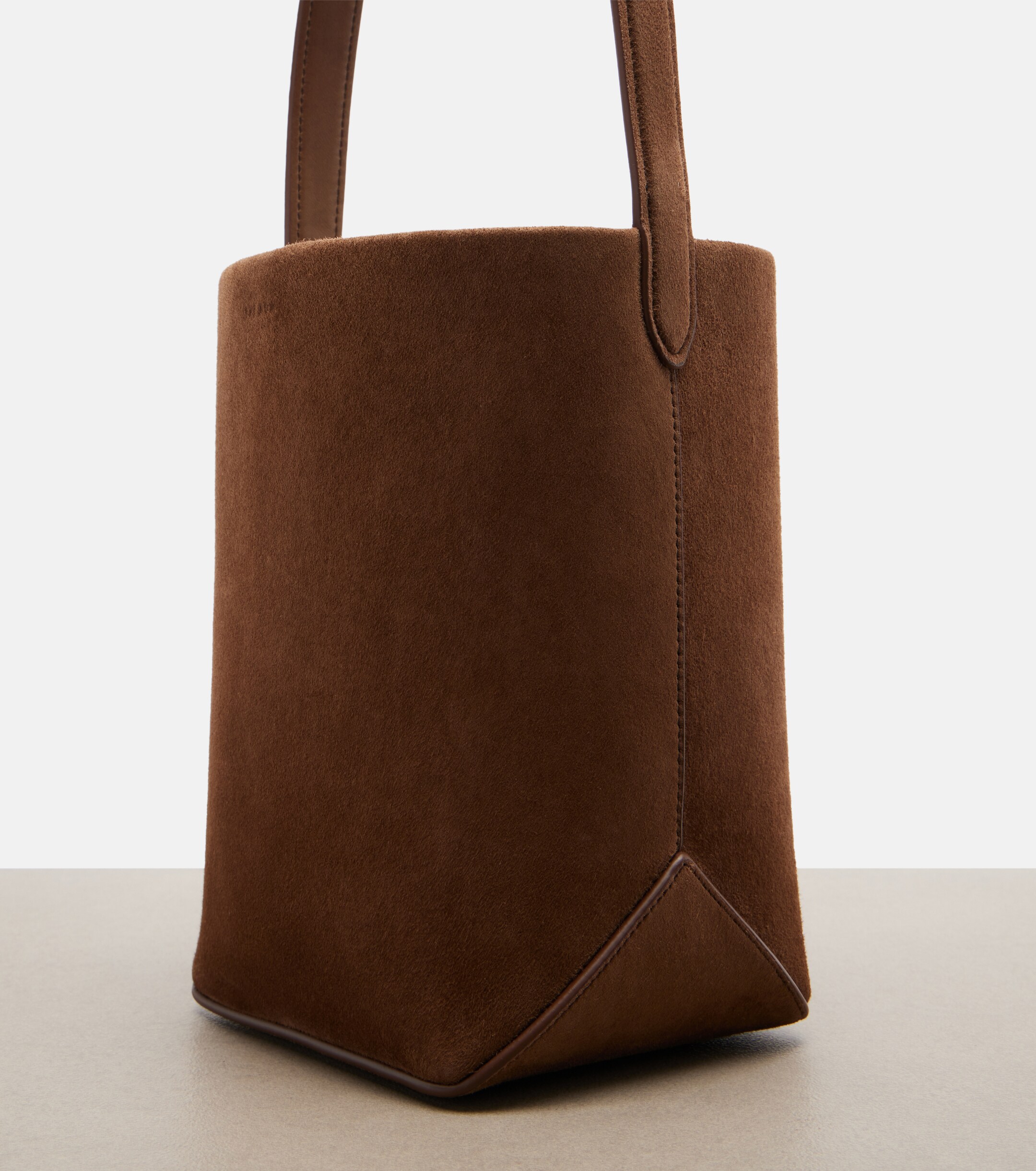 The Row Park Edge N/S Small suede bucket bag