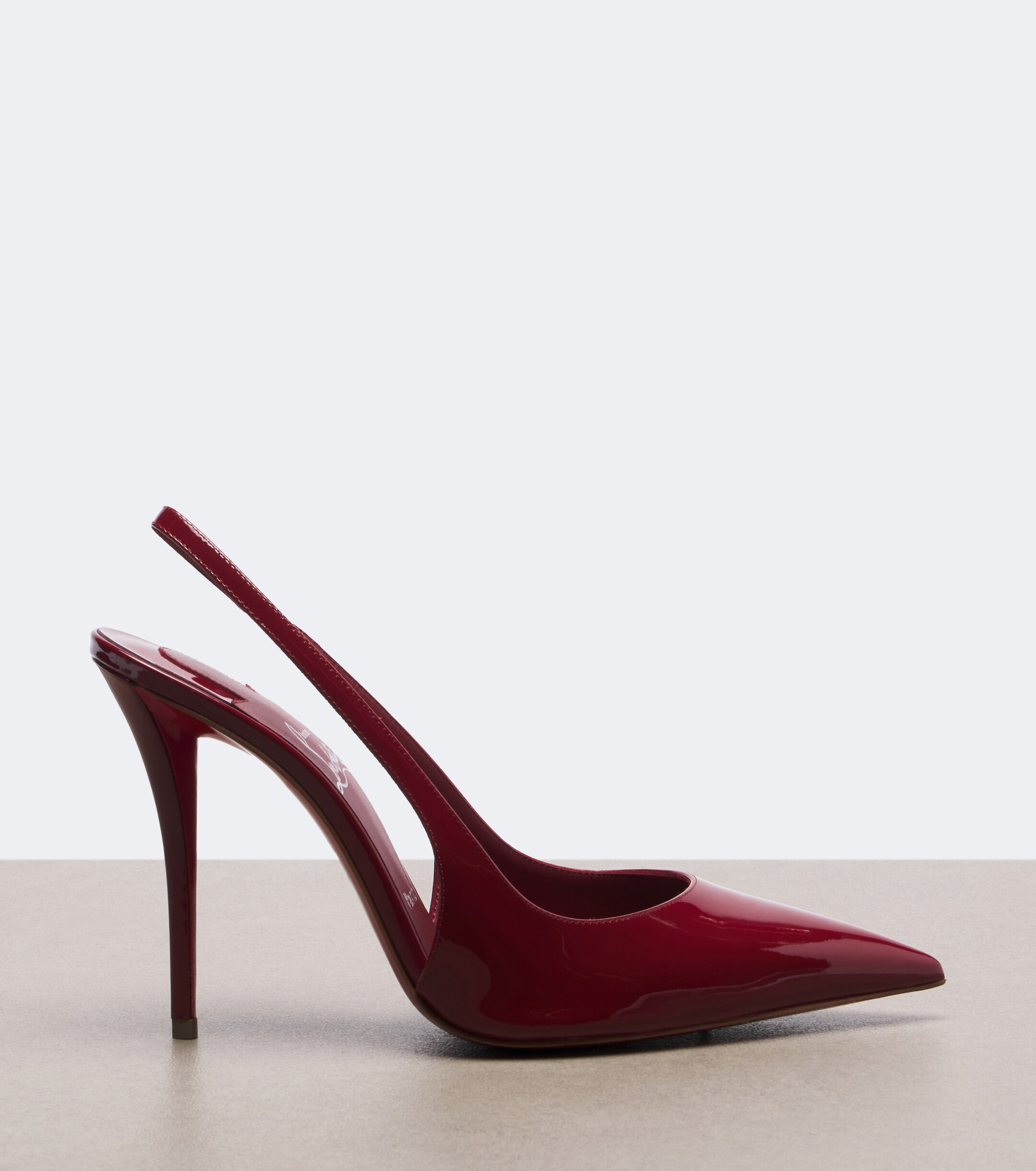 CHRISTIAN LOUBOUTIN Christian Louboutin Miss Z patent leather slingback pumps