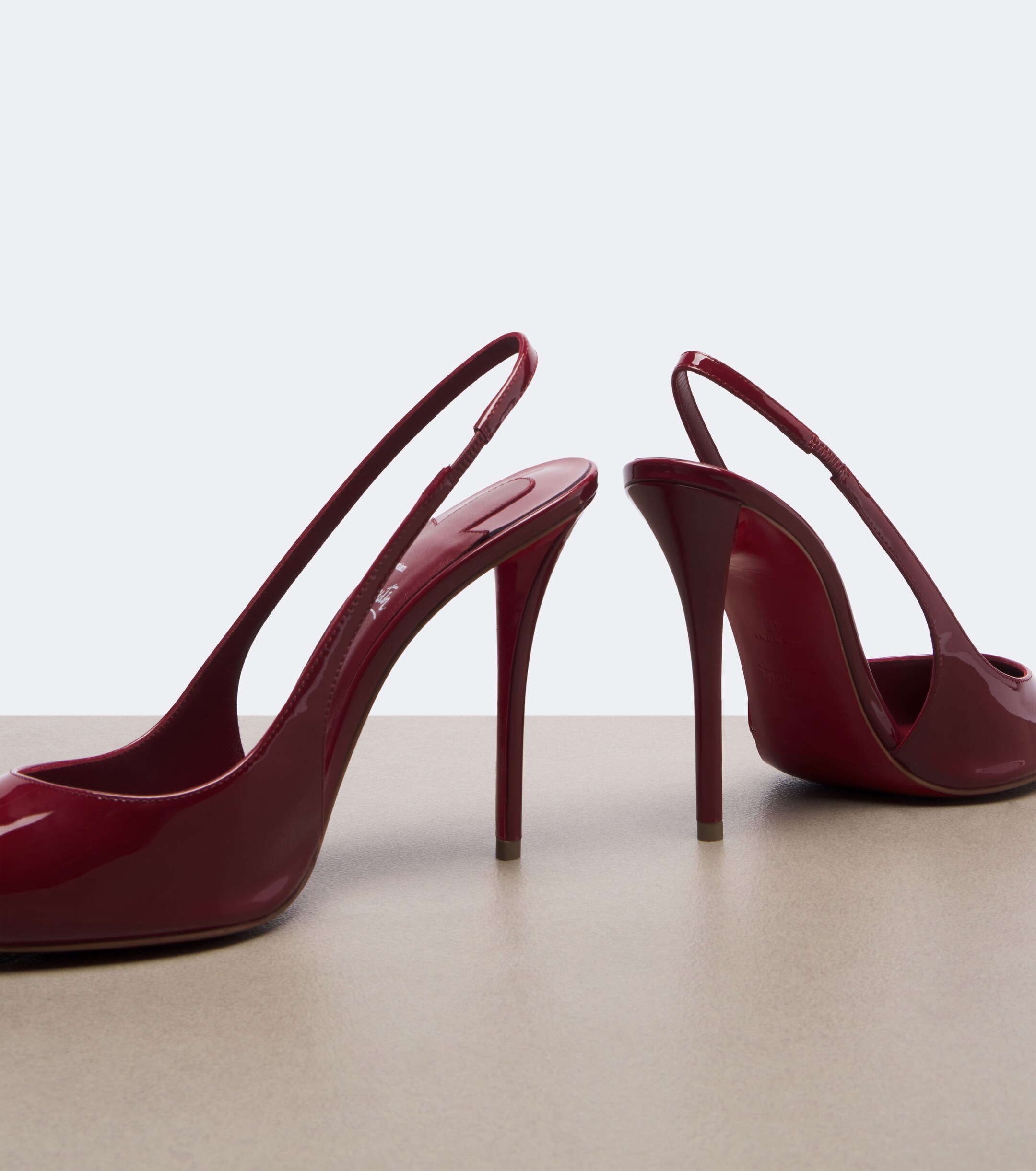 CHRISTIAN LOUBOUTIN Christian Louboutin Miss Z patent leather slingback pumps