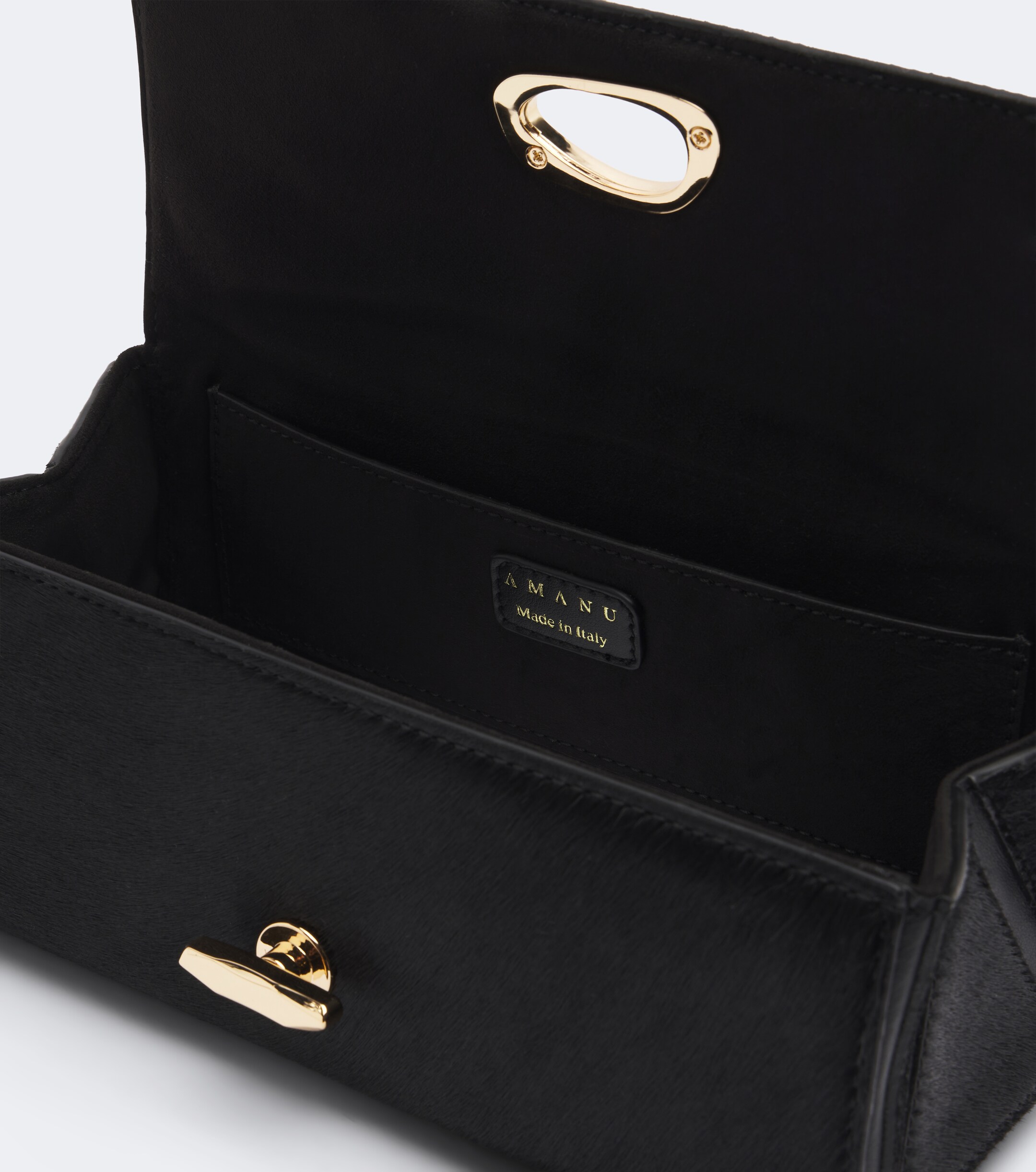 AMANU Amanu Tanzania calf hair clutch