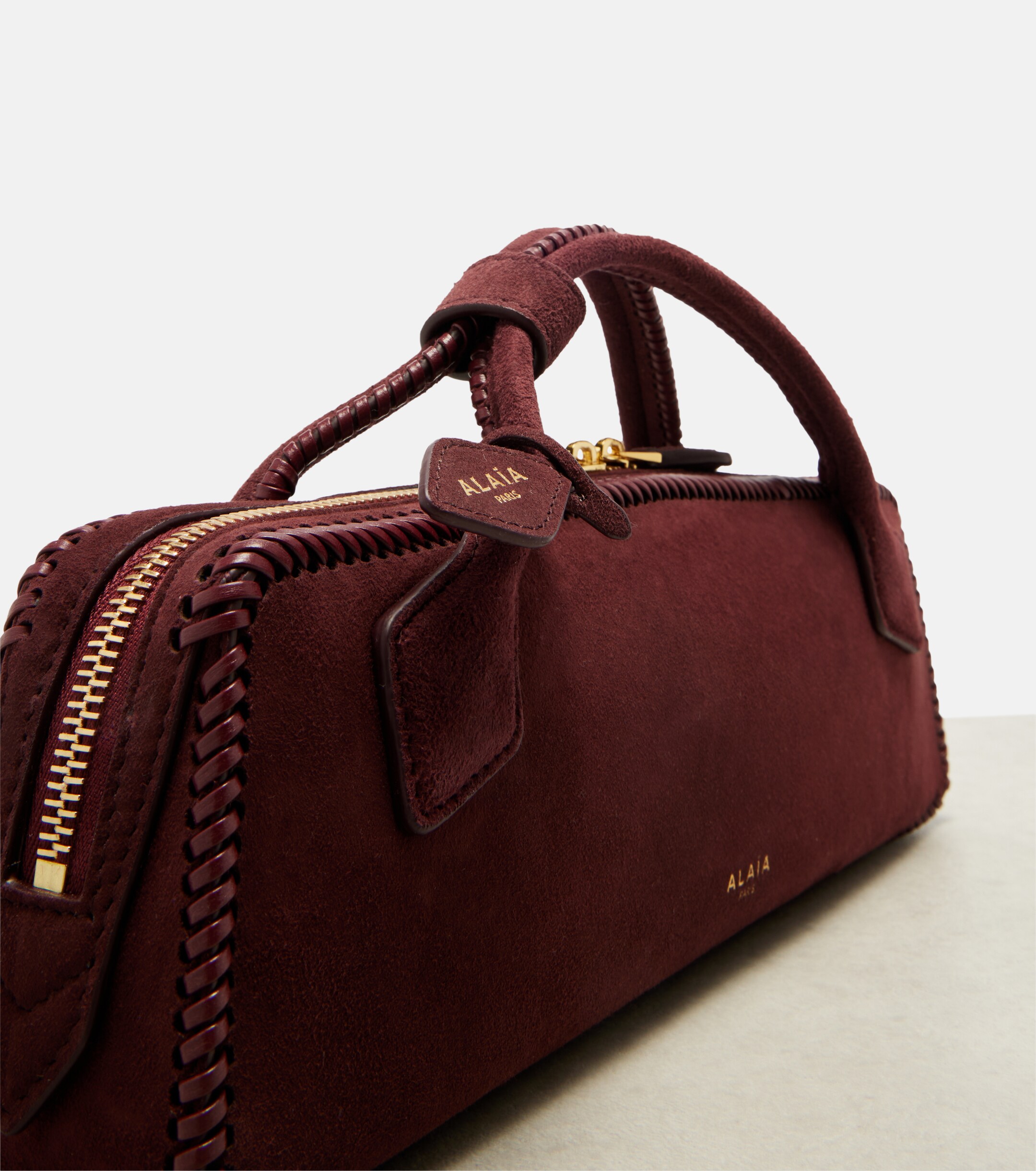 Alaïa Le Teckel Small suede clutch