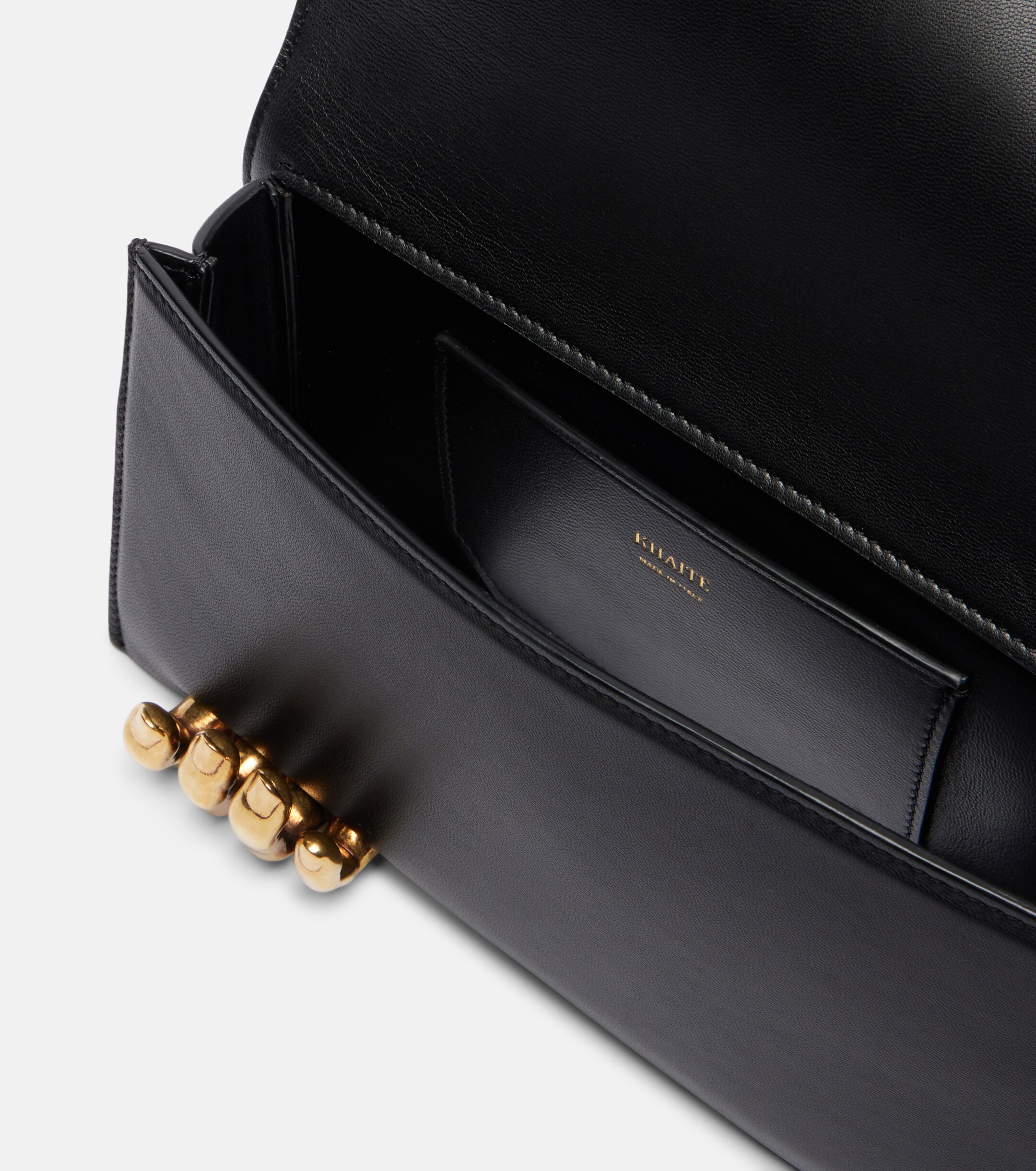 KHAITE Hand leather clutch