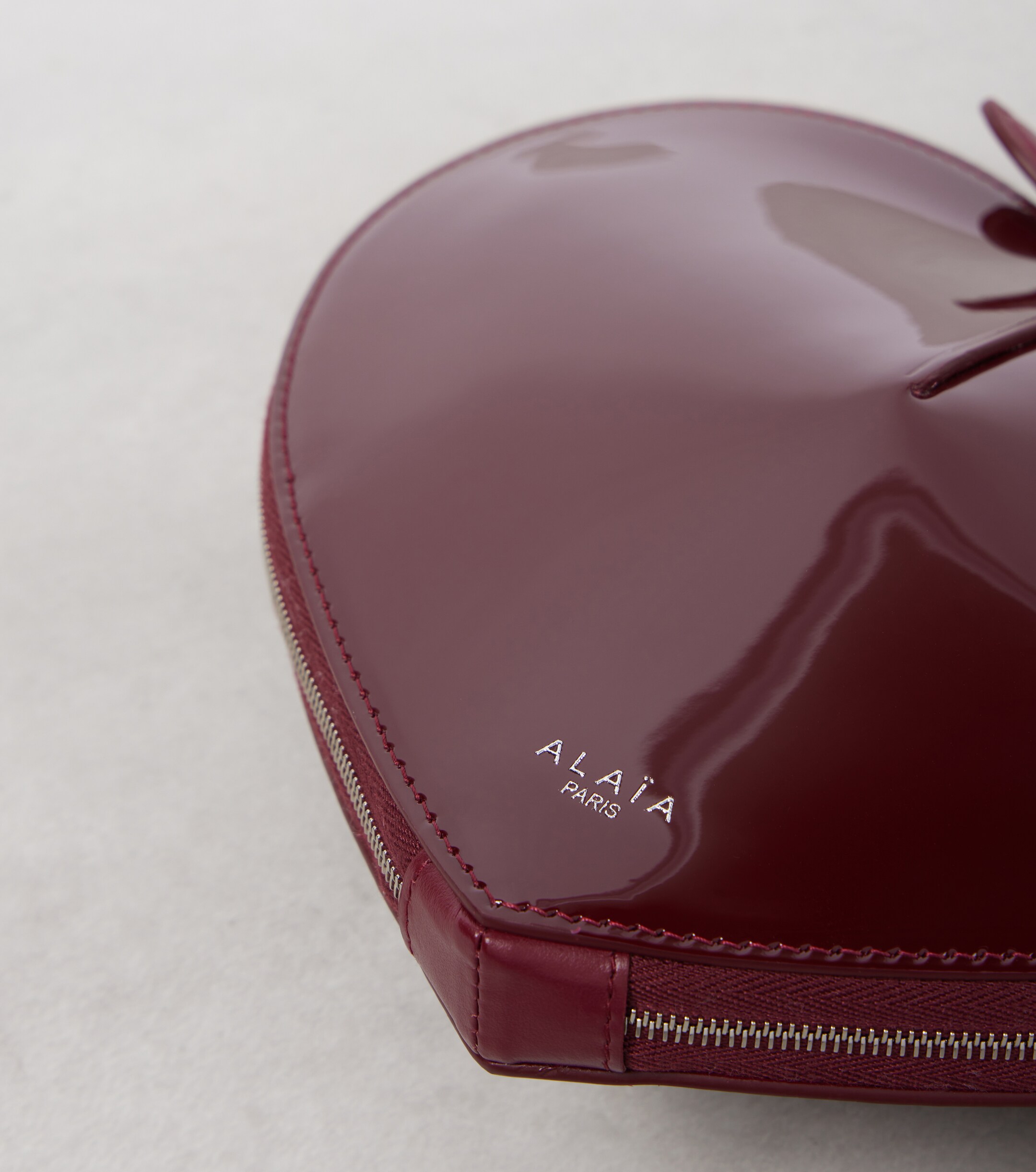 Alaïa Le Cœur patent leather crossbody bag
