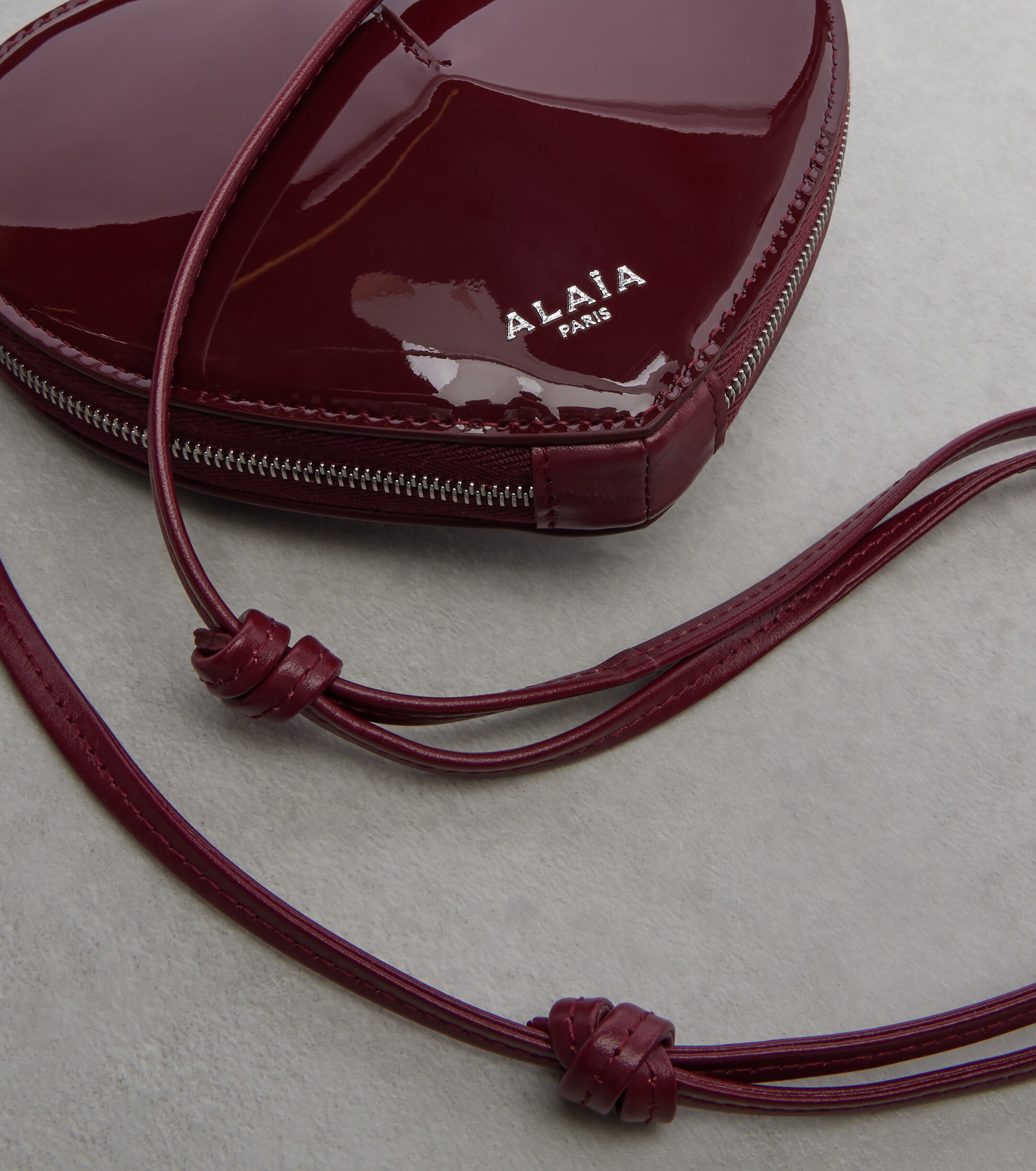 Alaïa Le Cœur Small patent leather crossbody bag