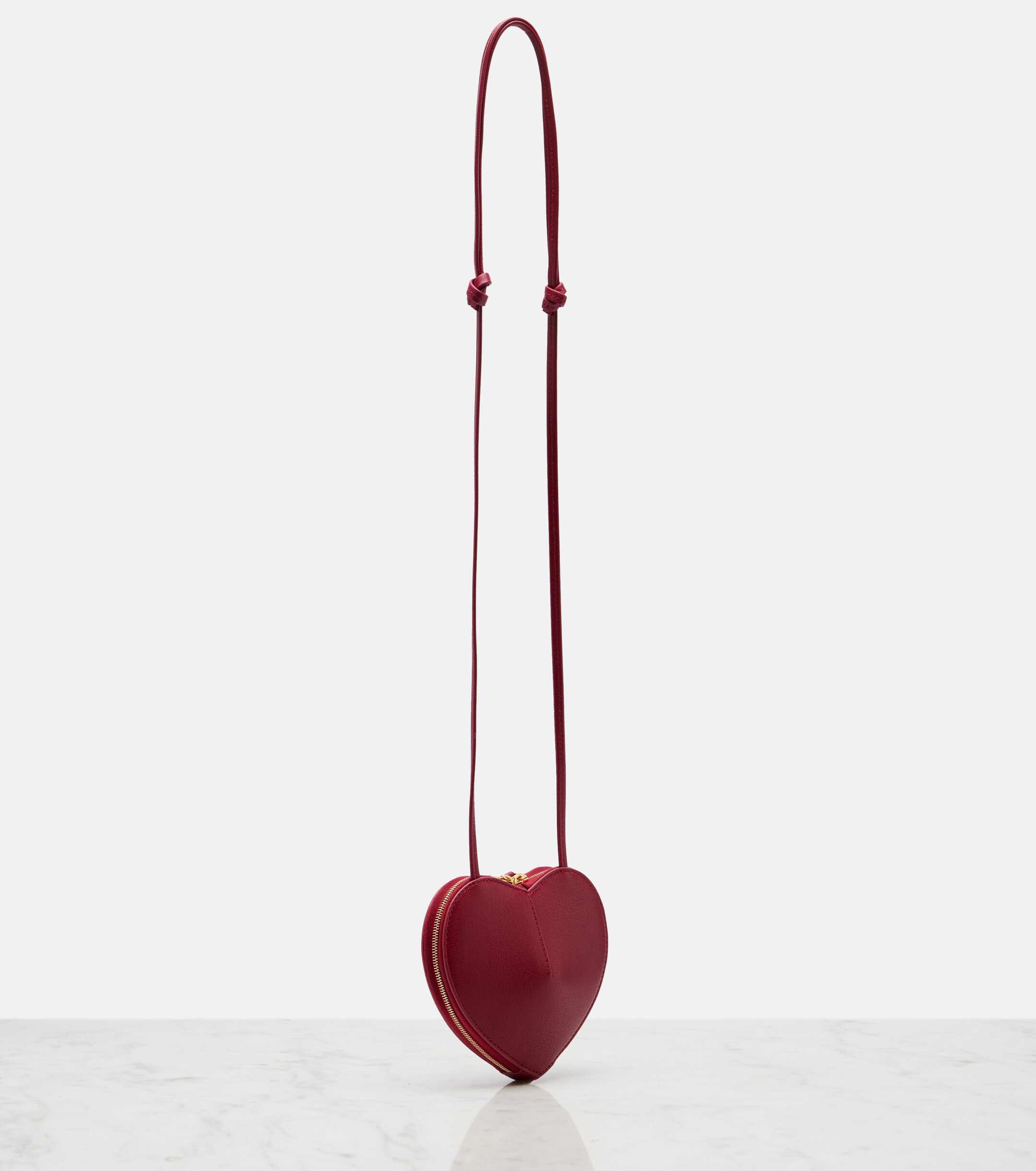 Alaïa Le Cœur leather and suede crossbody bag