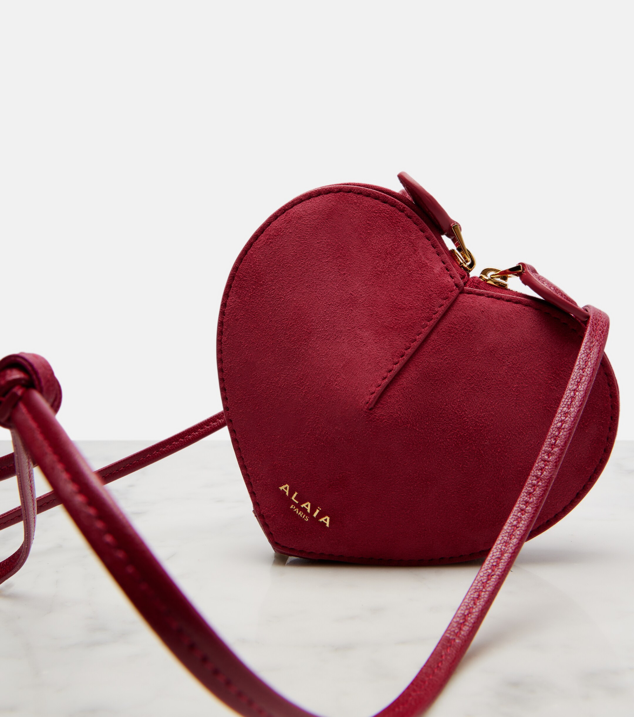 Alaïa Le Cœur leather and suede crossbody bag