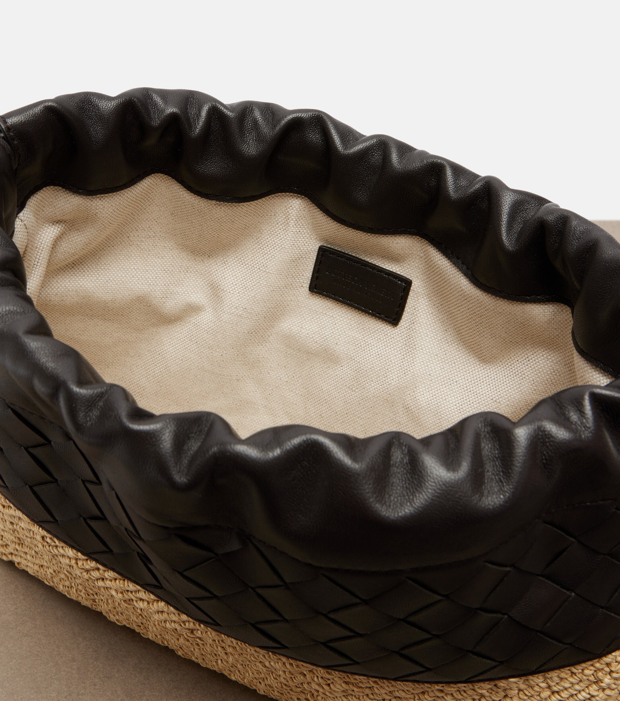 Bottega Veneta Dustbag Small raffia and leather pouch