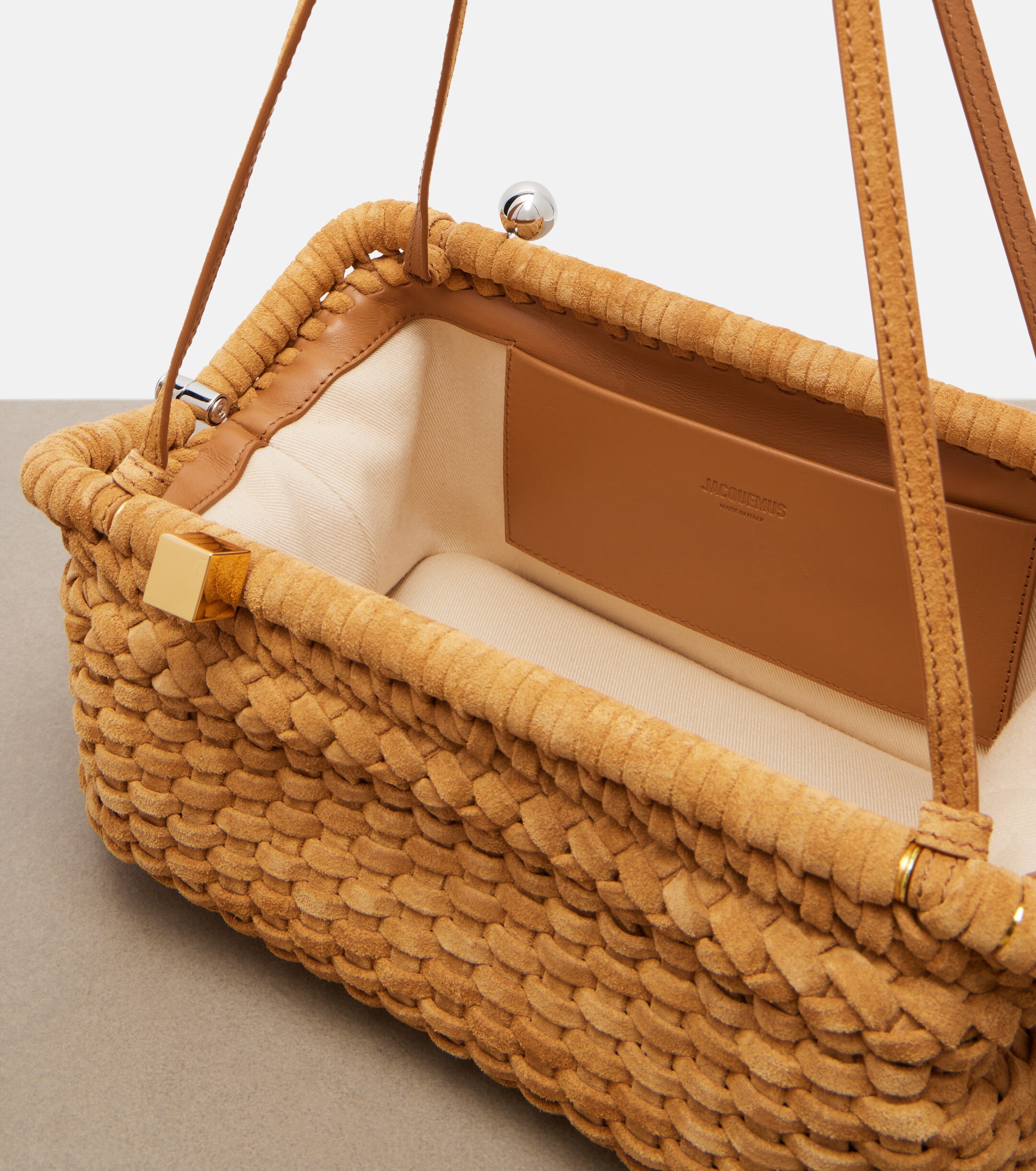 Jacquemus Salon woven suede clutch