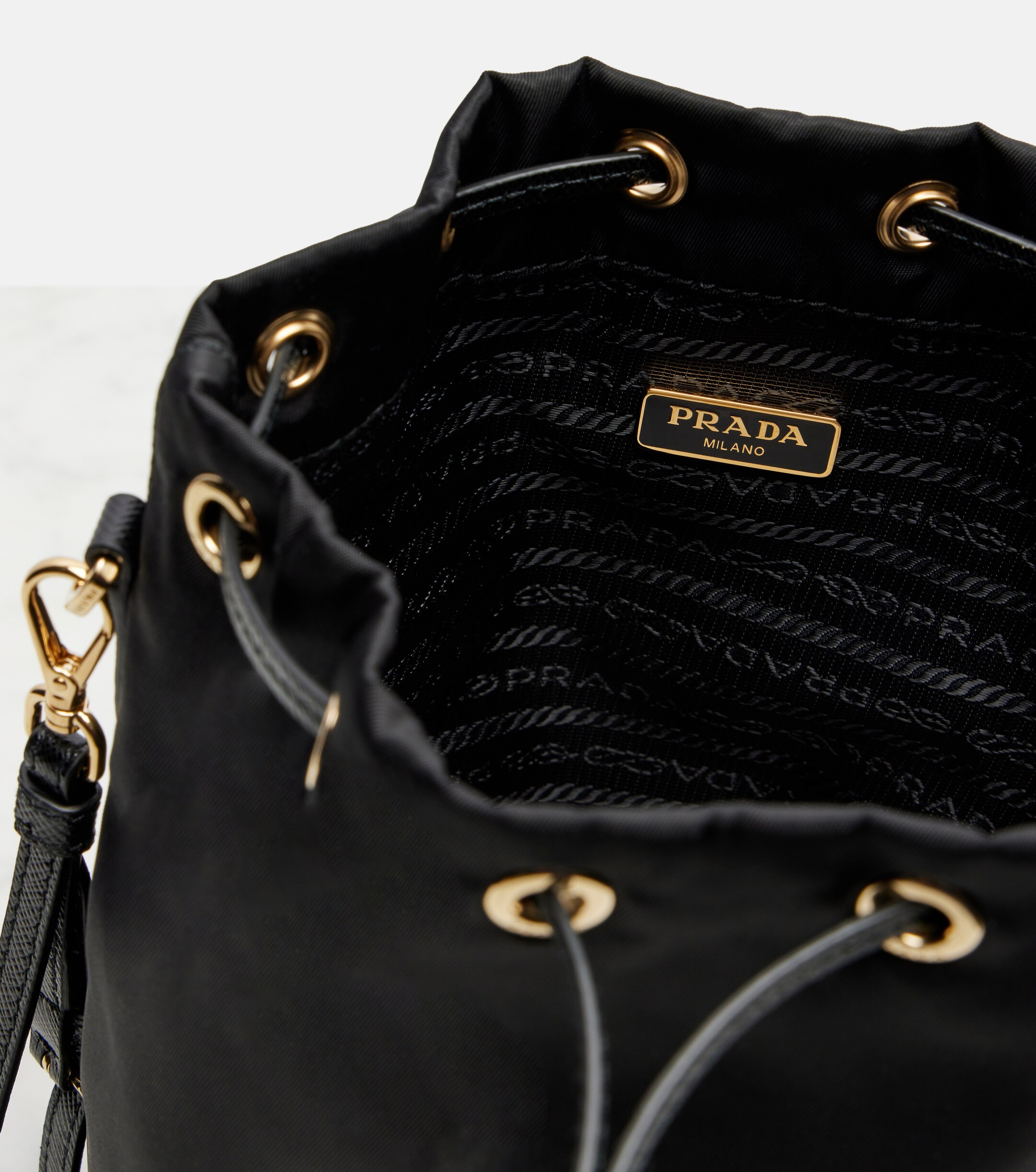 Prada Re-Nylon leather-trimmed bucket bag