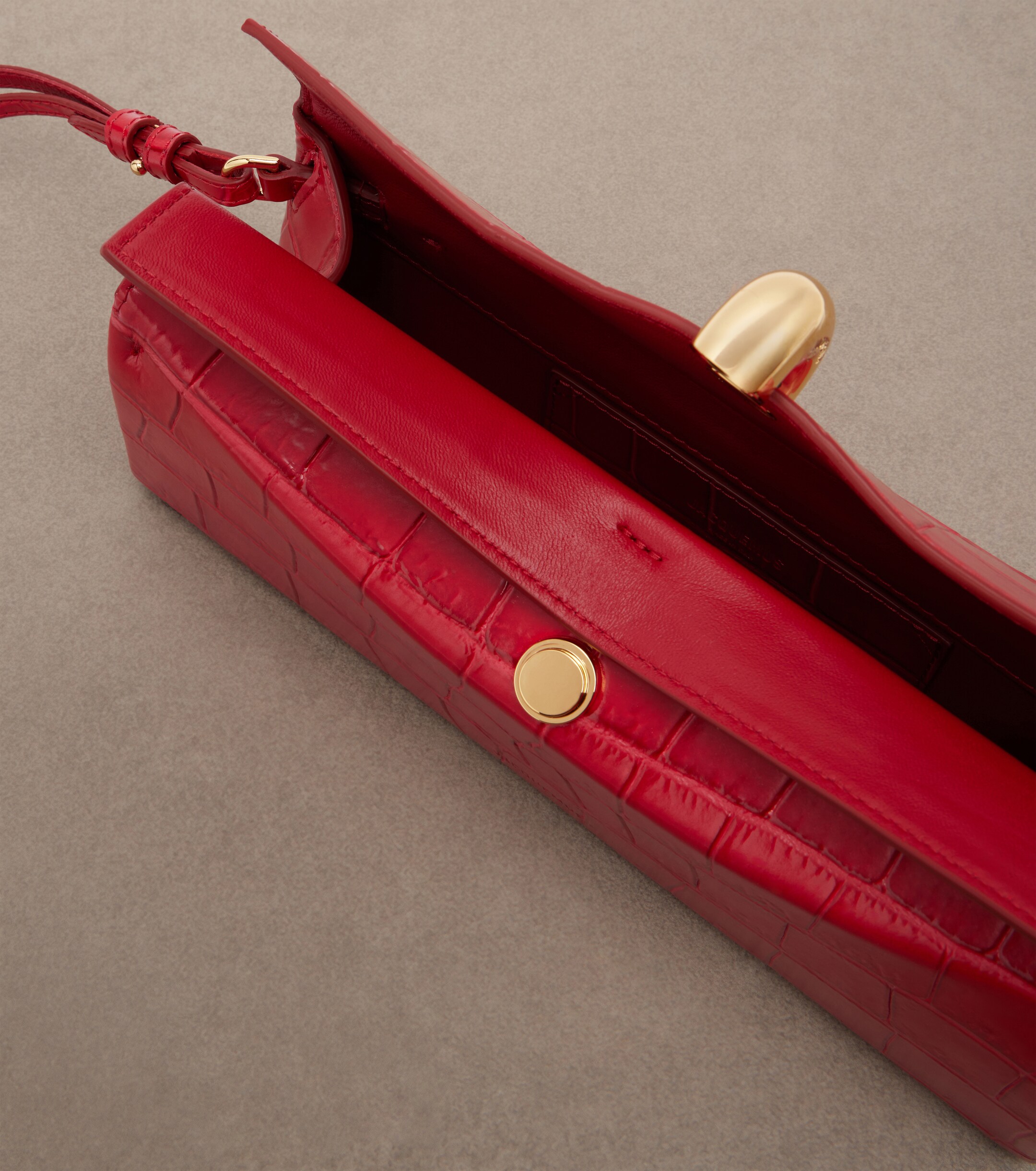 Jacquemus Valérie croc-effect leather clutch