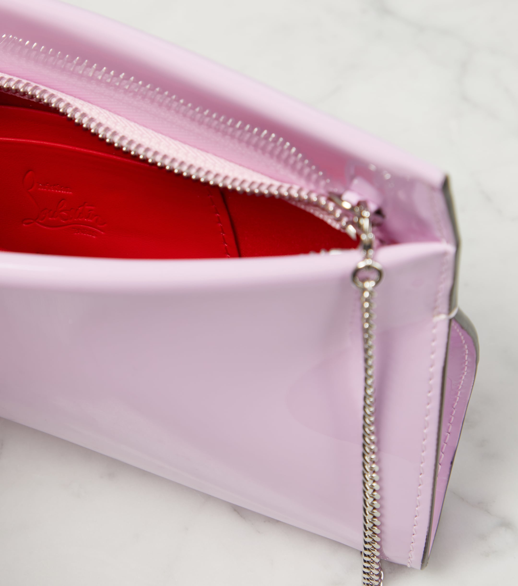 CHRISTIAN LOUBOUTIN Loubitwist Small patent leather clutch