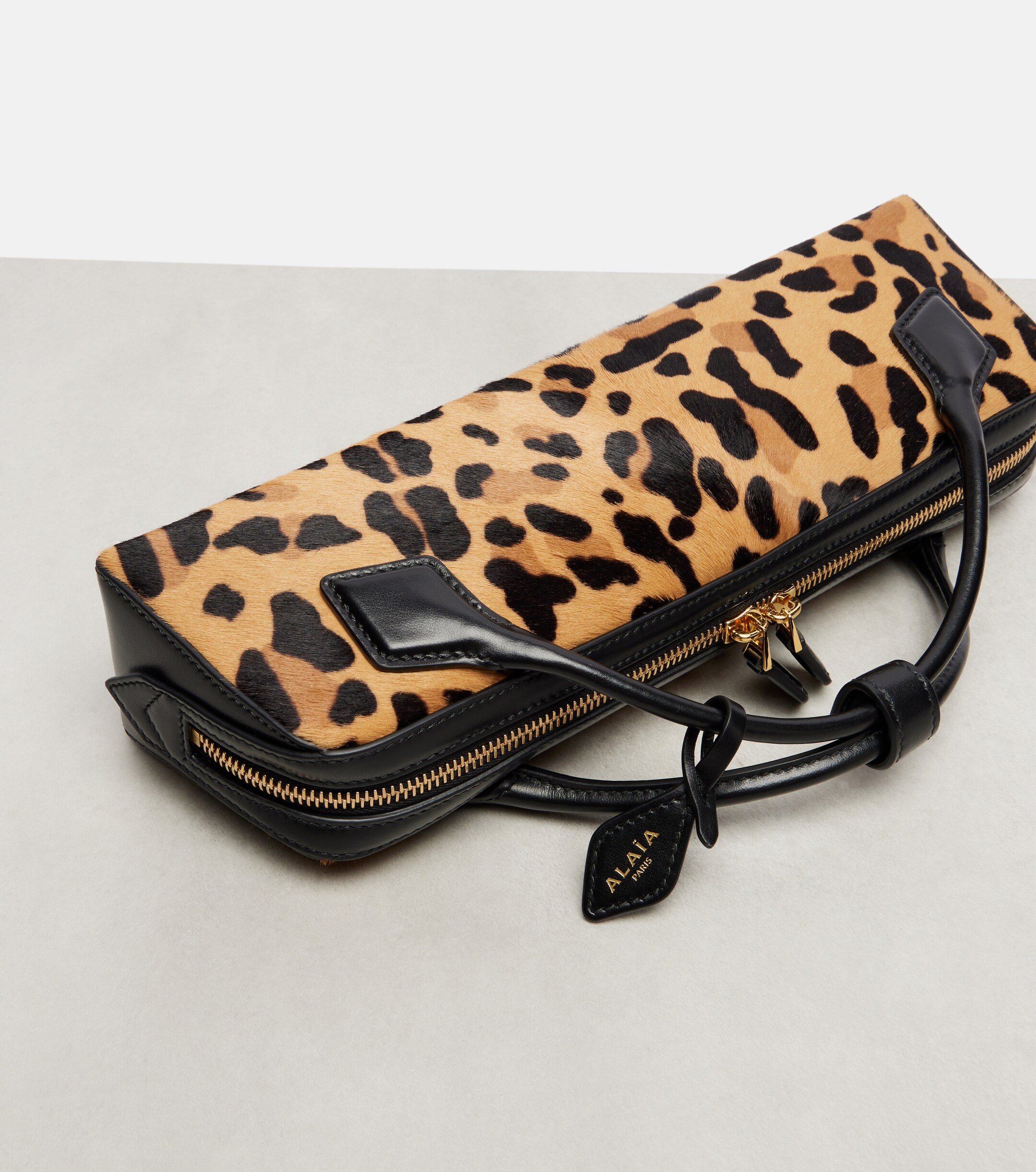 Alaïa Le Teckel leopard-print calf hair clutch