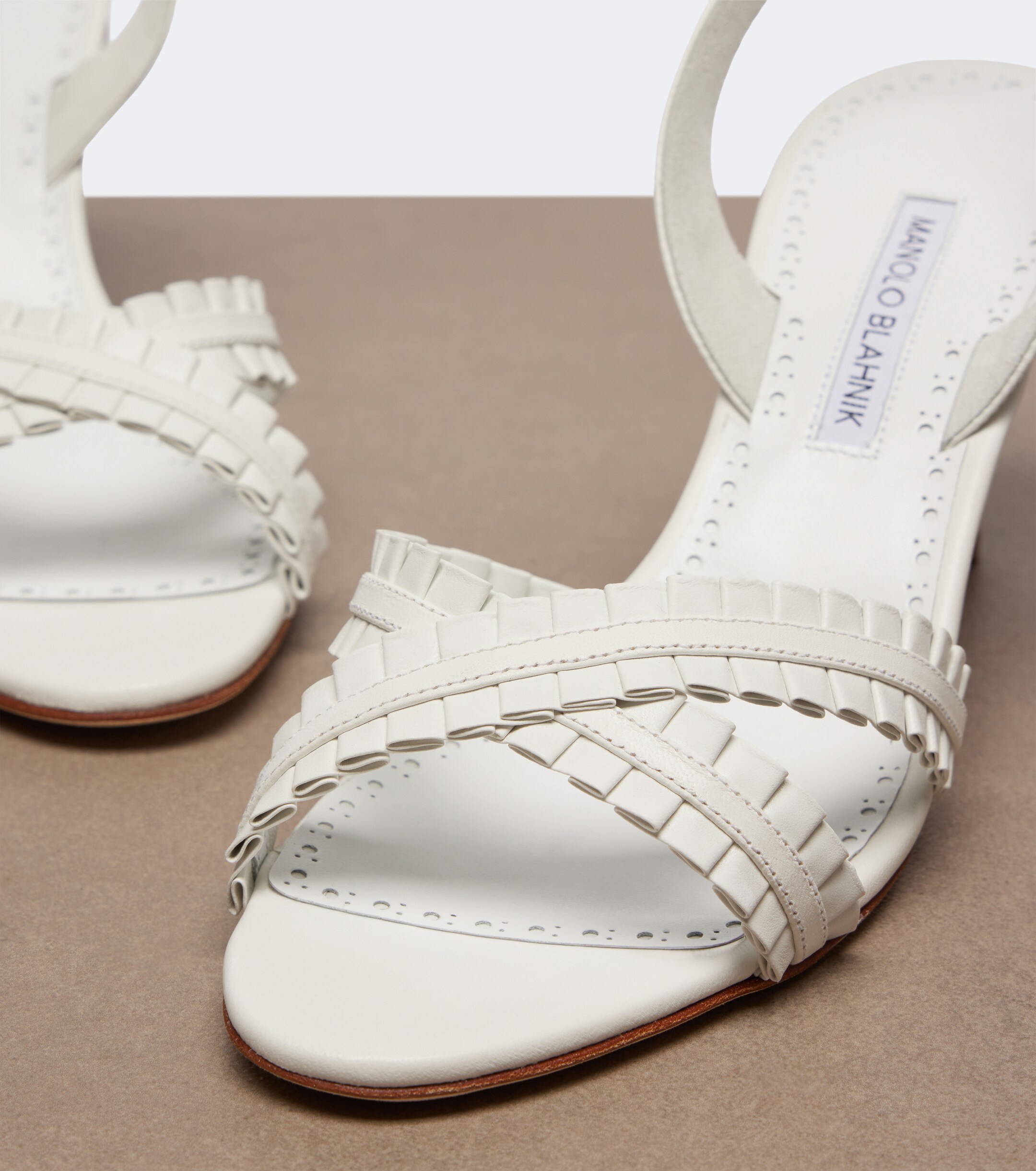 MANOLO BLAHNIK Manolo Blahnik Volusan leather slingback sandals