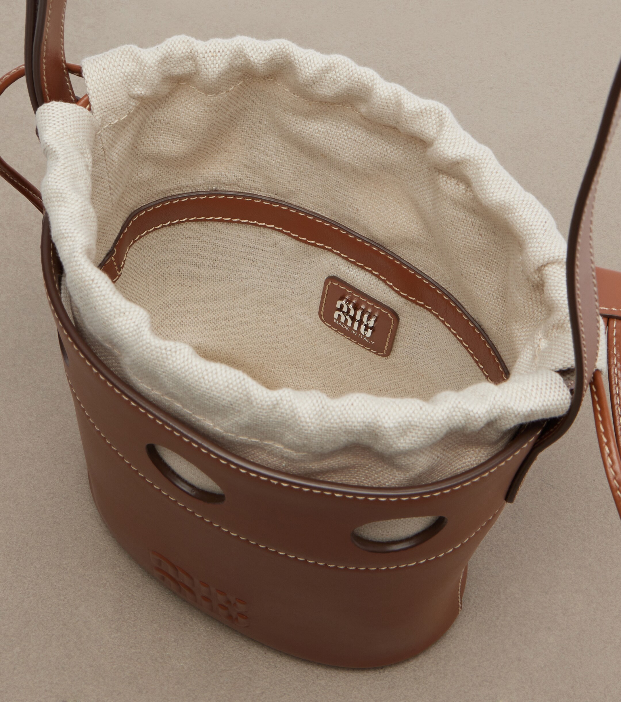 Miu Miu Perforated leather bucket bag